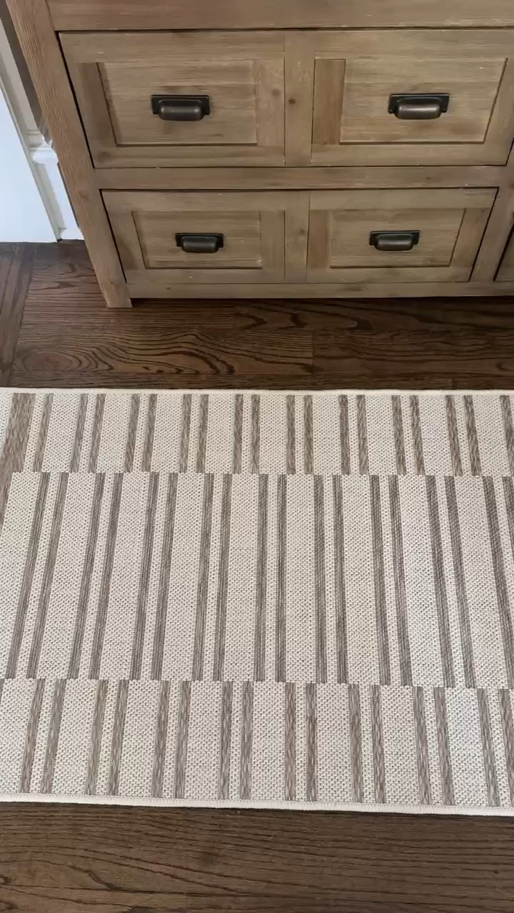 This rug is such a pretty way to add pattern without overwhelming the room. The soft neutral stripes work beautifully with the warm wood tones and make the space feel layered, classic, and inviting.

striped area rug, neutral area rug, bedroom rug, living room rug, neutral home decor, patterned rug, fall home decor, cozy home styling, modern coastal decor, timeless interiors, layered home decor, girlonthehudson