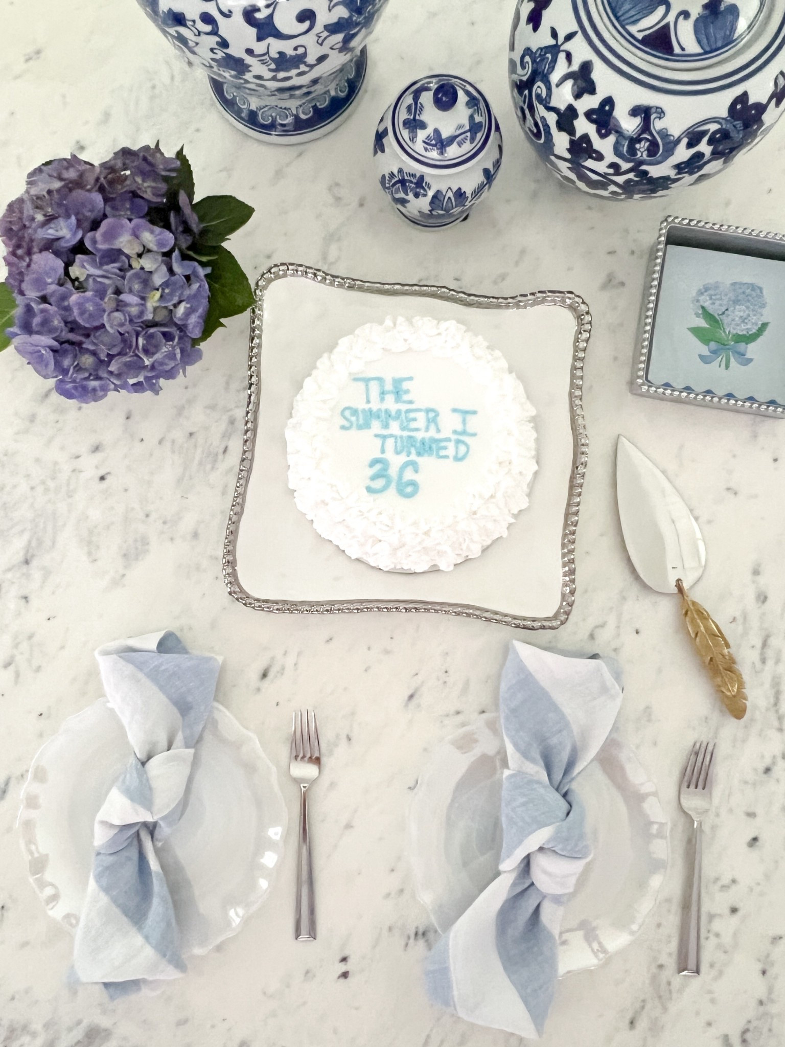 The summer I turned pretty inspired blue & white coastal birthday dessert table settings with elegant iridescent glass dessert plates, blue & white cabana striped linen napkins, beaded silver serving pieces & a golden feather cake knife perfect for your next party

#LTKHome #LTKSeasonal #LTKParties