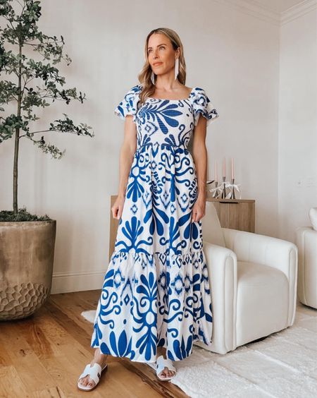 Love this blue patterned dress with white sandals and a fun straw bag. #amazonfashion #womensstyle



#LTKparties #LTKU #LTKshoecrush
