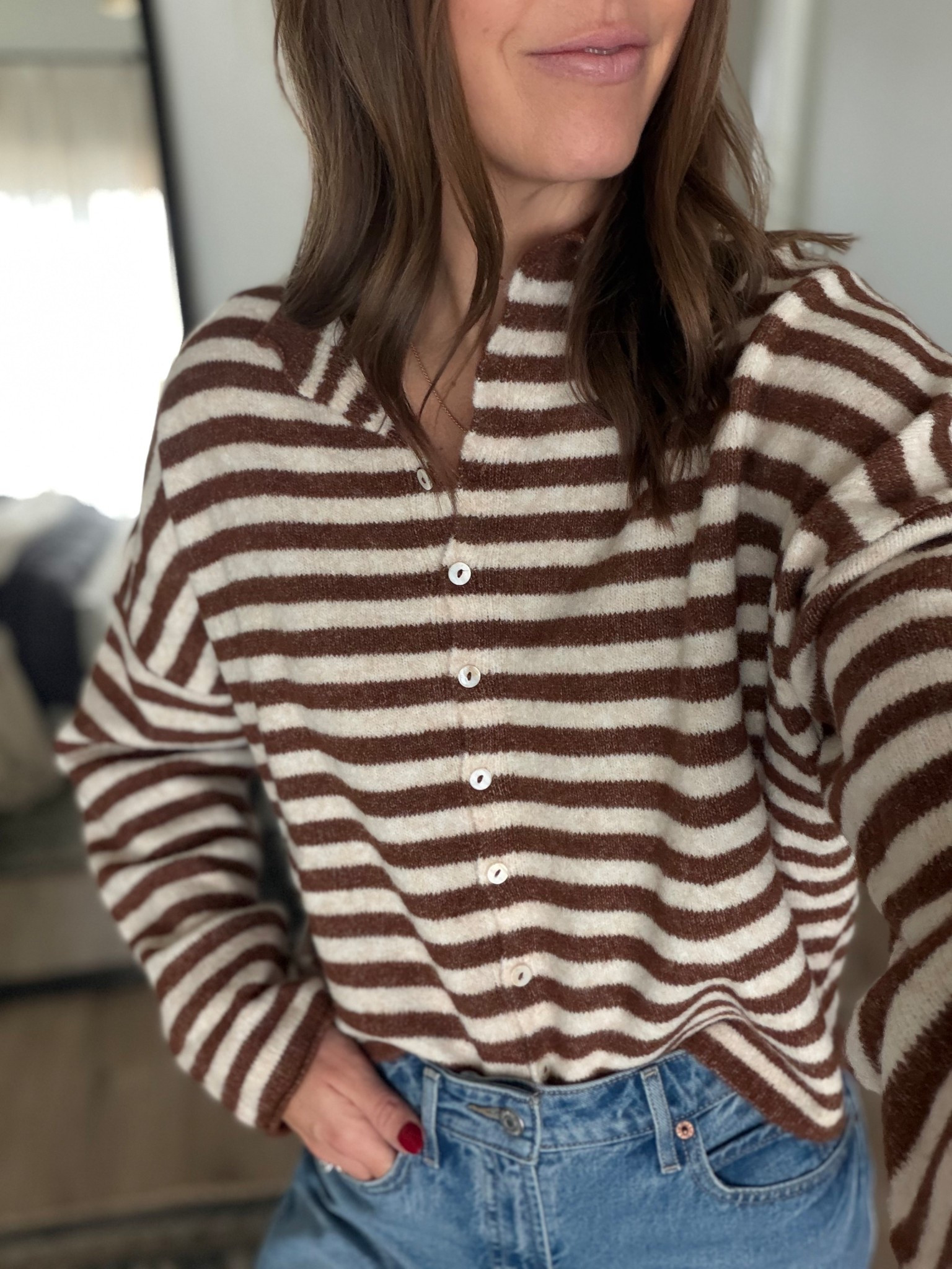 Ah the coziest sweater is back in stock in a new color. I’m loving this brown stripe cardigan. Fits oversized, wearing a S  

#LTKFindsUnder100 #LTKSeasonal #LTKStyleTip