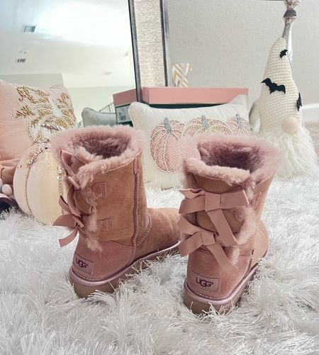 Bow Ugg Booties! My favorite for cozy Fall outfits and winter vacation. Also linked an ugg comparable from Amazon (in brown and pink). Xoxo 

Follow my shop @lovelyfancymeblog on the @shop.LTK app to shop this post and get my exclusive app-only content!

#liketkit #LTKtravel #LTKU #LTKSeasonal #LTKshoecrush
@shop.ltk