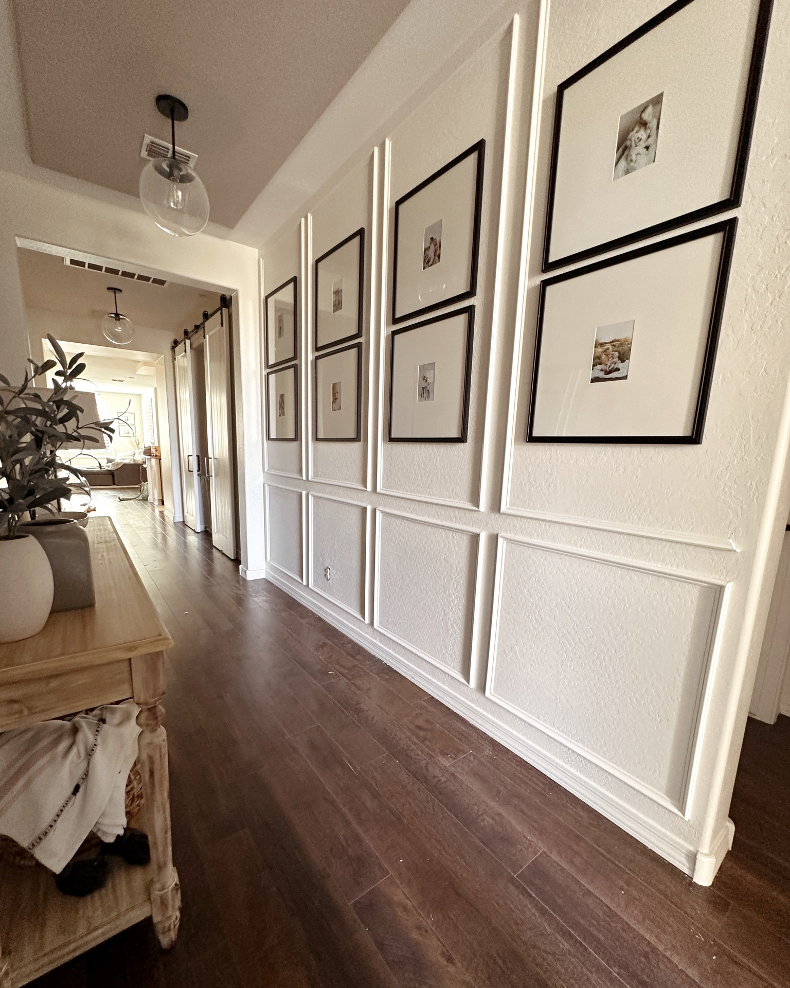 Progress has been made on our long hallway/entry way! So much more to do (including adding one more piece of trim) but this was a very easy DIY for beginners! Here’s everything I used to create this wall!  

#LTKHome