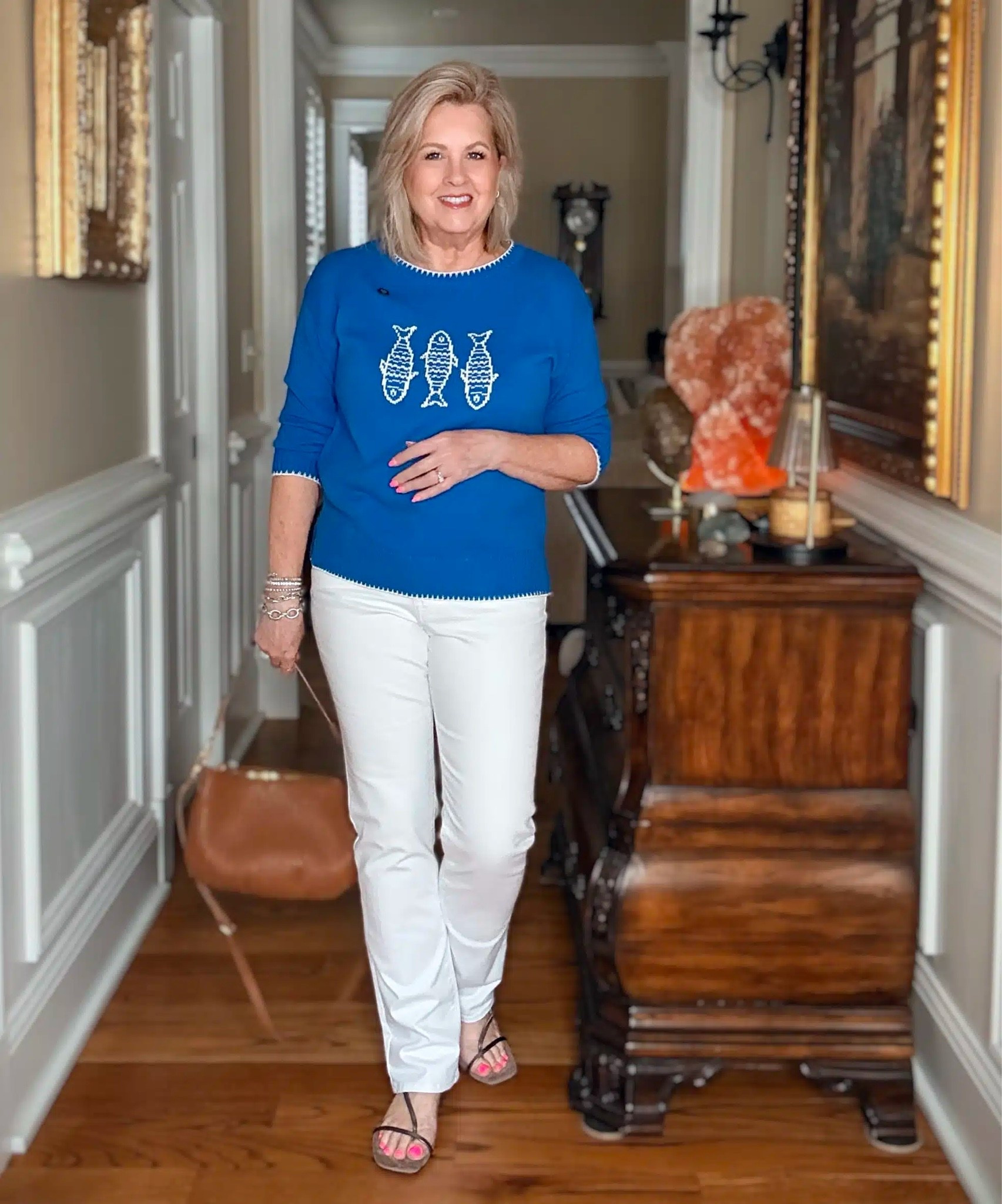 A great way to wear white jeans for Spring! I love this fun sardine sweater and I’m wearing a medium.

#LTKWorkwear #LTKOver40 #LTKootd
