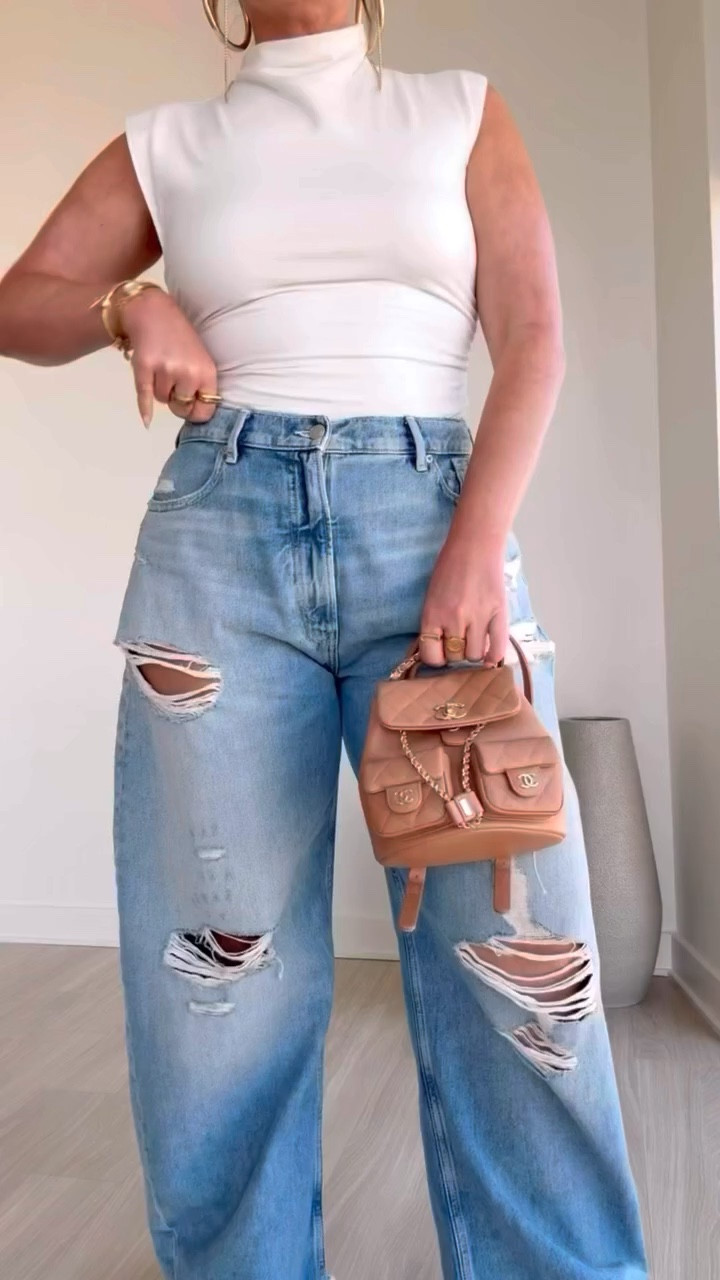 I love these distressed, barrel-legged jeans

#LTKdayinmylife #LTKSeasonal #LTKootd