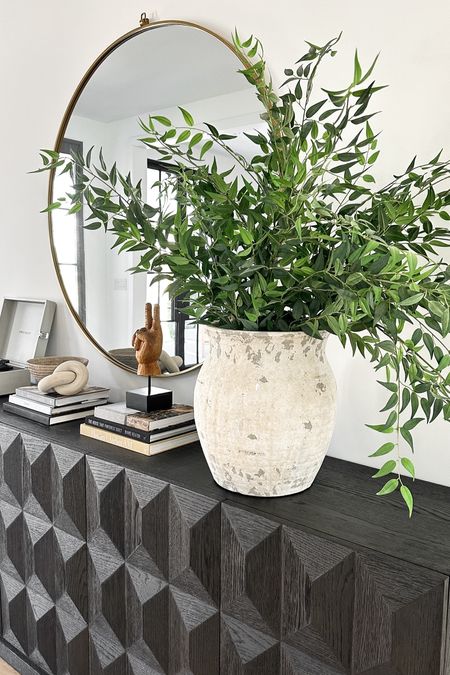 Added some stunning new (artificial yet unbelievably realistic-looking) stems to our foyer console.  I cannot resist stems that allow me to create an organic, unstyled shape.  These do just that and the 46” length helps to makes a dramatic visual impact.

#LTKhome