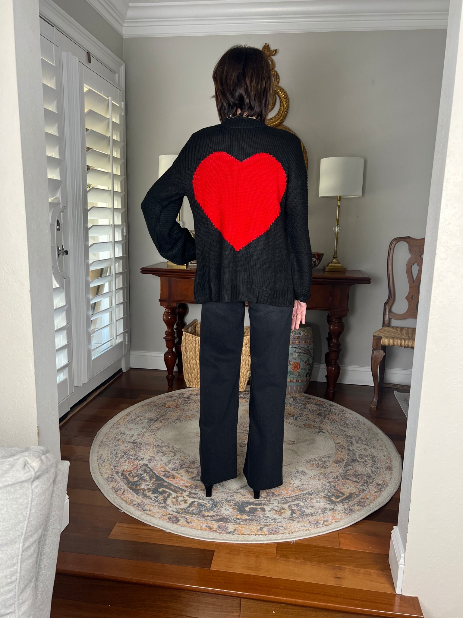 heart cardigan, black wide leg jeans, over 50 outfits 

#LTKSeasonal #LTKootd #LTKgrwm