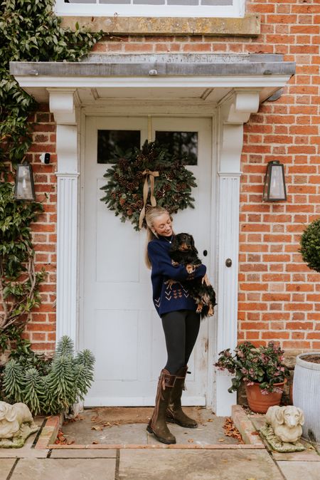Christmas Day outfit, dog walking outfit, Christmas decor, knee high boots, Christmas wreath, Christmas jumper

#LTKeurope #LTKstyletip #LTKSeasonal