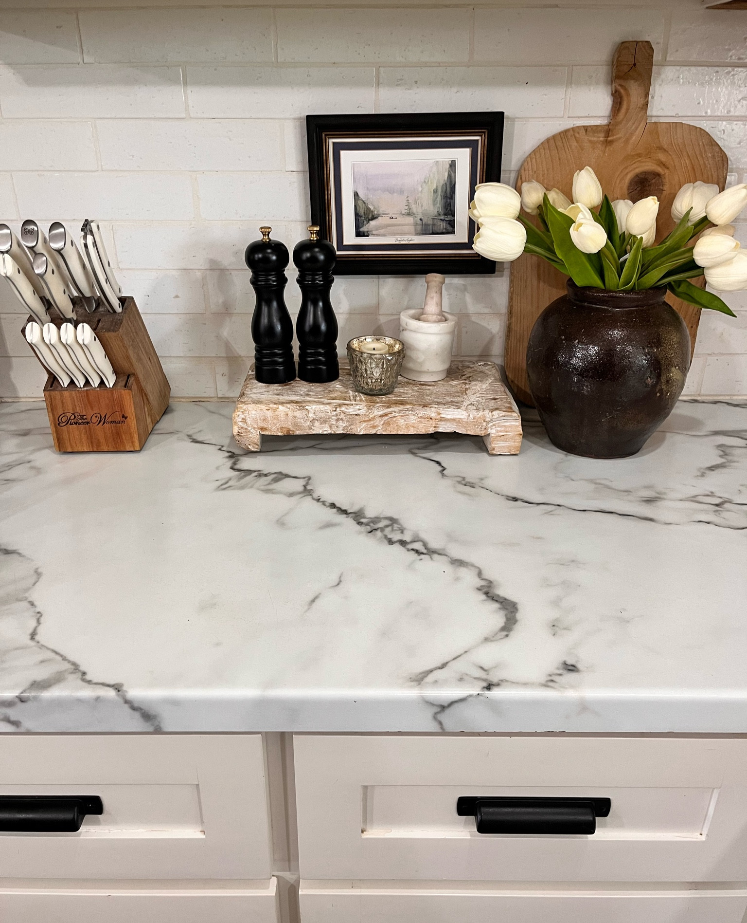 Mitch decor, Walmart knife set 
Faux tulips from Amazon. So realistic and the perfect home refresh for spring! 

#LTKstyletip #LTKhome #LTKfindsunder50