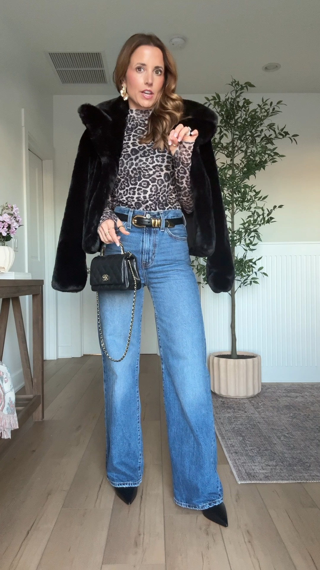 Date night outfit. Girls night out outfit. Vegas outfit. Concert outfit. Amazon mesh leopard top in XS. Levi wide leg ribcage jeans in 24 - runs a little big so size down if in-between. I shrunk mine in washer/dryer. Christian Louboutin boots - went up half a size. Walmart faux fur coat in XS. 

#LTKgrwm #LTKPetite #LTKootd