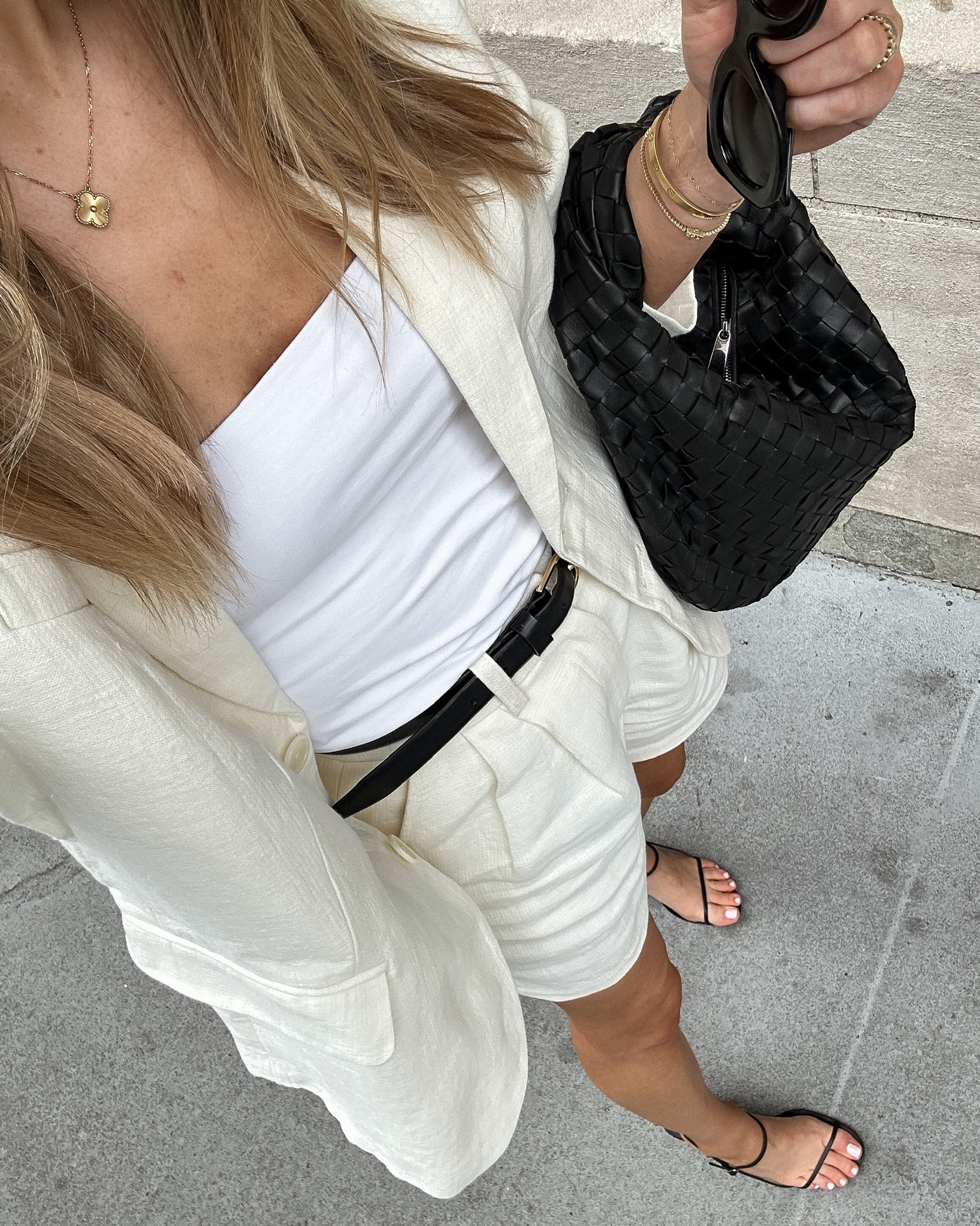 Fashion Jackson wearing white blazer, white shorts, black sandals, summer outfit #fashionjackson #sandals #bottega 

#LTKshoecrush #LTKsalealert #LTKunder100
