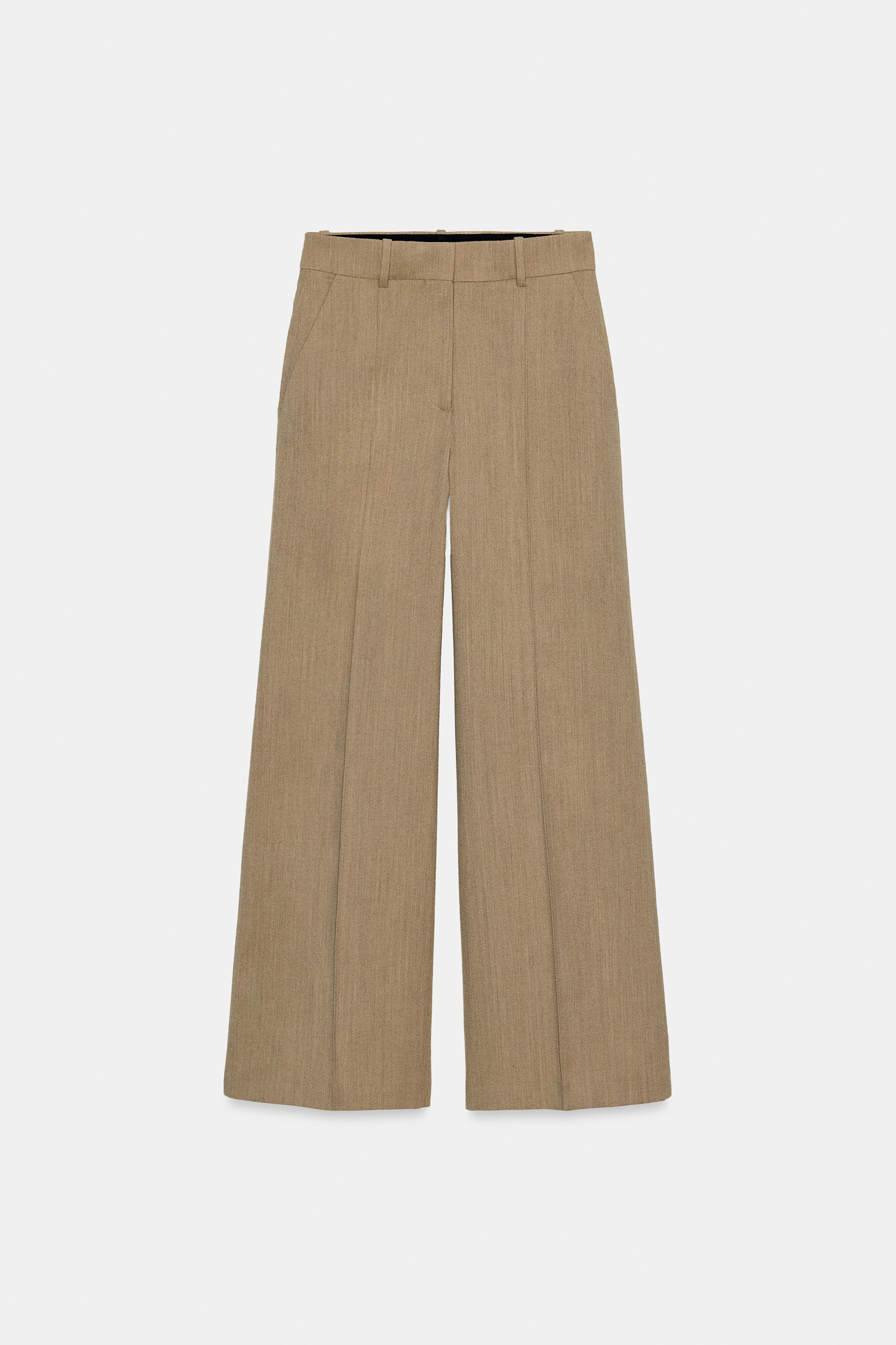 Model height: 178 cmZARA WOMAN COLLECTIONTrousers with main fabric made from wool yarn. Mid-waist... | Zara NL
