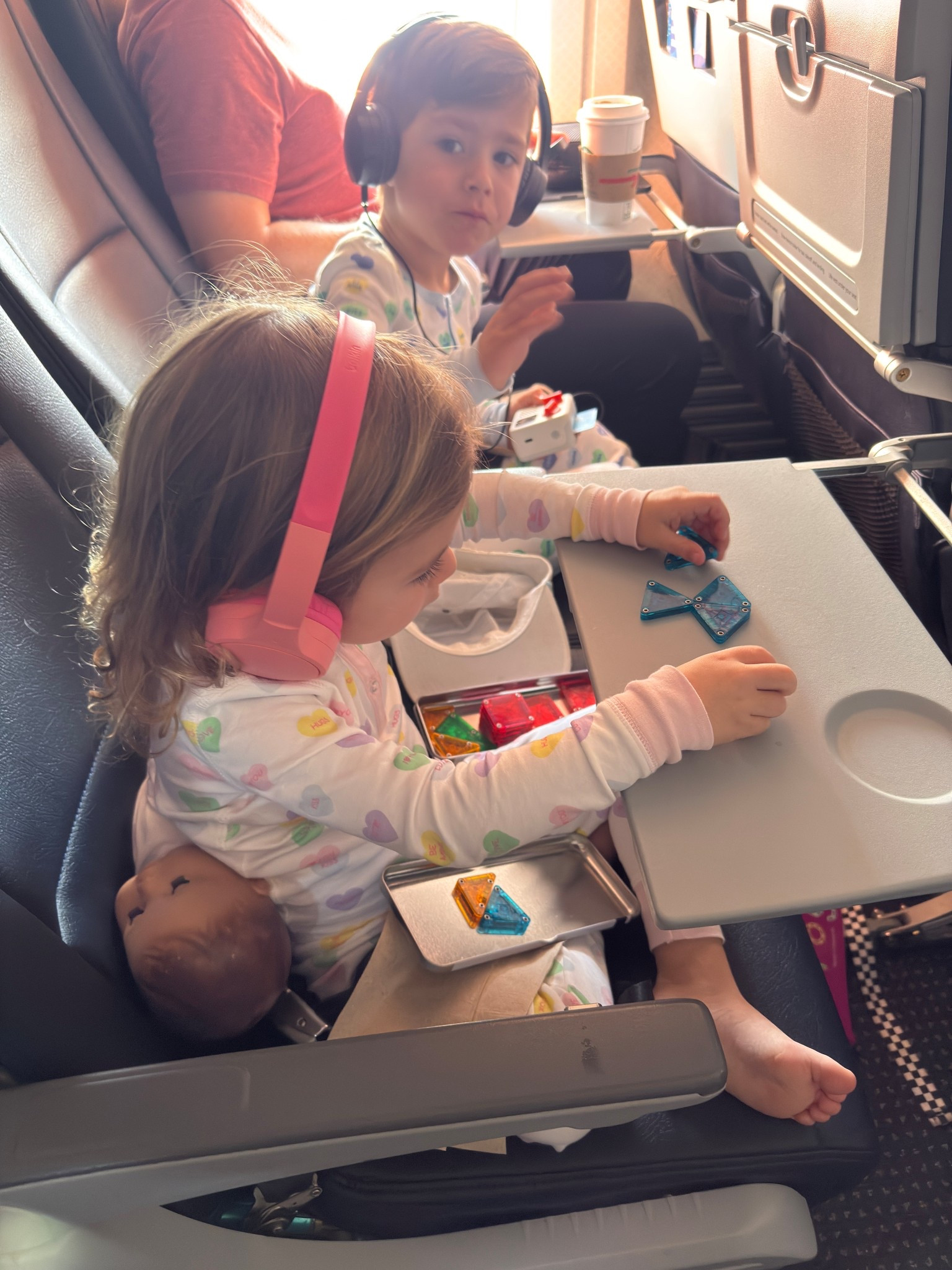 Another great travel activity is the travel set of magnatiles! 
Both of my kids have a set & will sit & build things for quite a while! 
These are always in our backpacks when traveling.

#LTKKids #LTKTravel #LTKmomlife