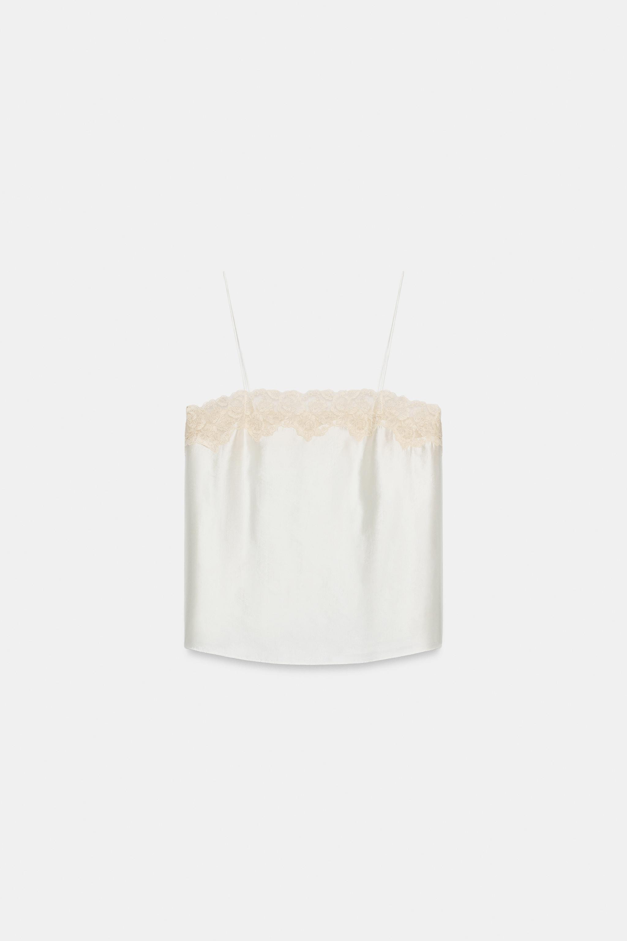 Model height: 178 cmZARA WOMAN COLLECTIONTop made from an 11% silk blend yarn. Featuring a straig... | Zara UK