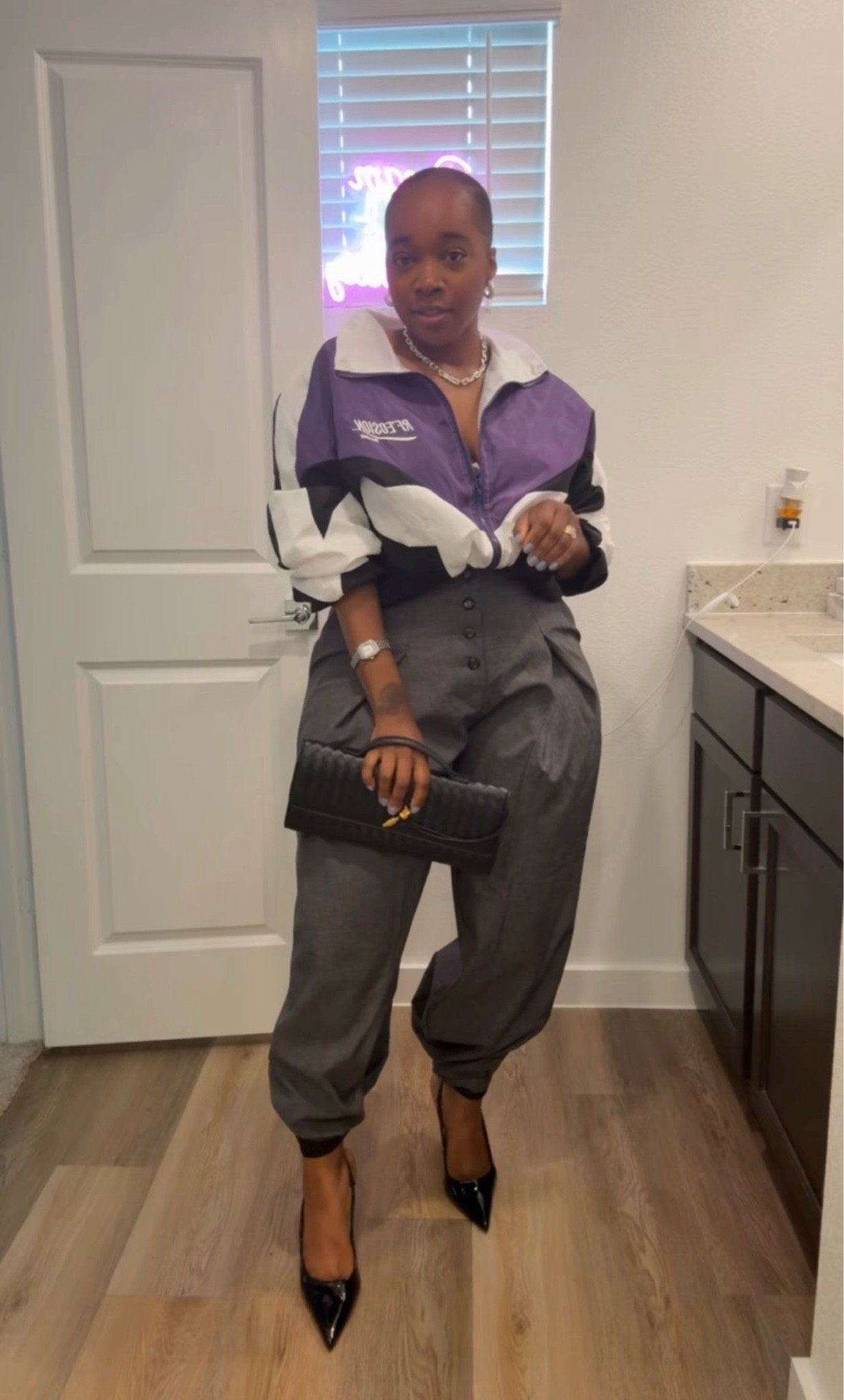 Elevated street style for your next event. 💜

A sporty windbreaker, tailored trousers, pointed-toe pumps, and a structured clutch create a look that's equal parts polished and unexpected.

Shop the outfit through my LTK. ✨

#LTKU #LTKMidsize