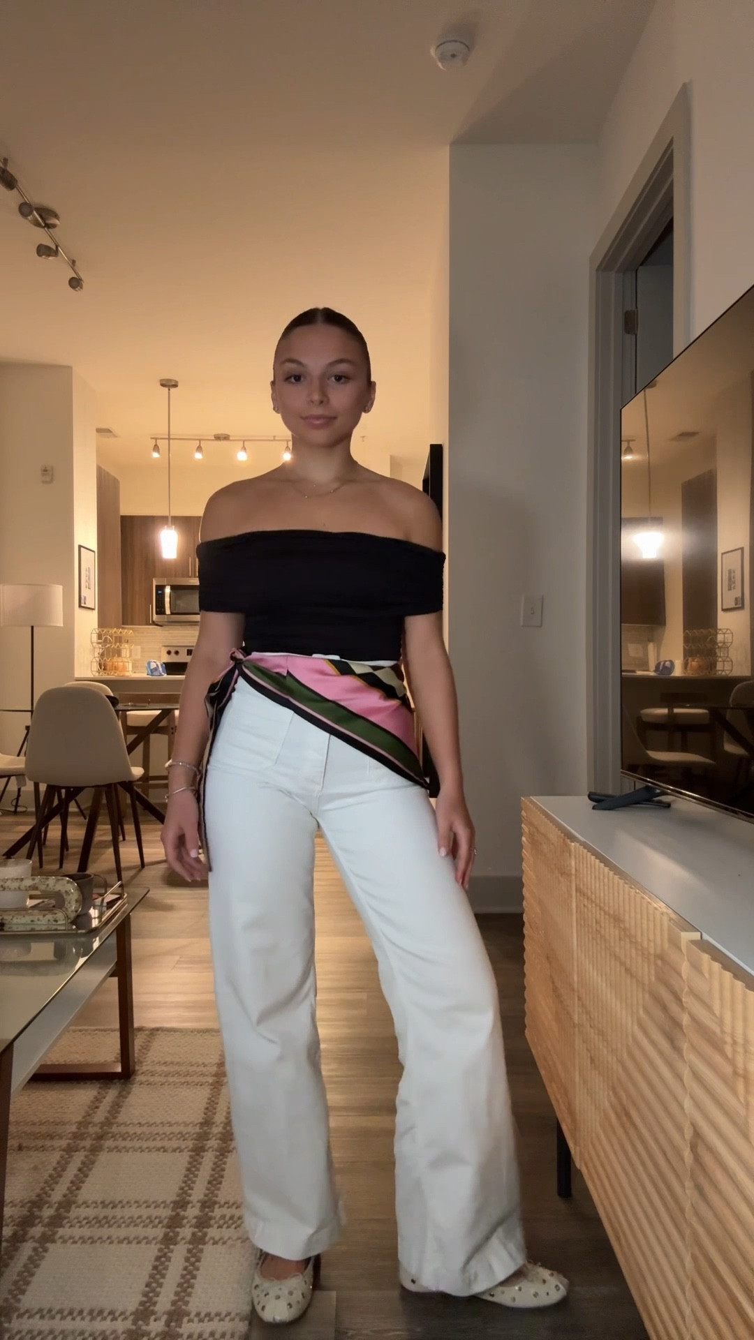 Off-shoulder chic meets effortless denim. I styled wide-leg white jeans with a sleek black top and finished it with a silk scarf tied at the waist for a pop of color. A simple but elevated look that works day to night.


#OOTD #LTKStyle #LTKFashion #EffortlessStyle #WideLegJeans #SummerOutfit #LTKUnder100 #StyleInspo