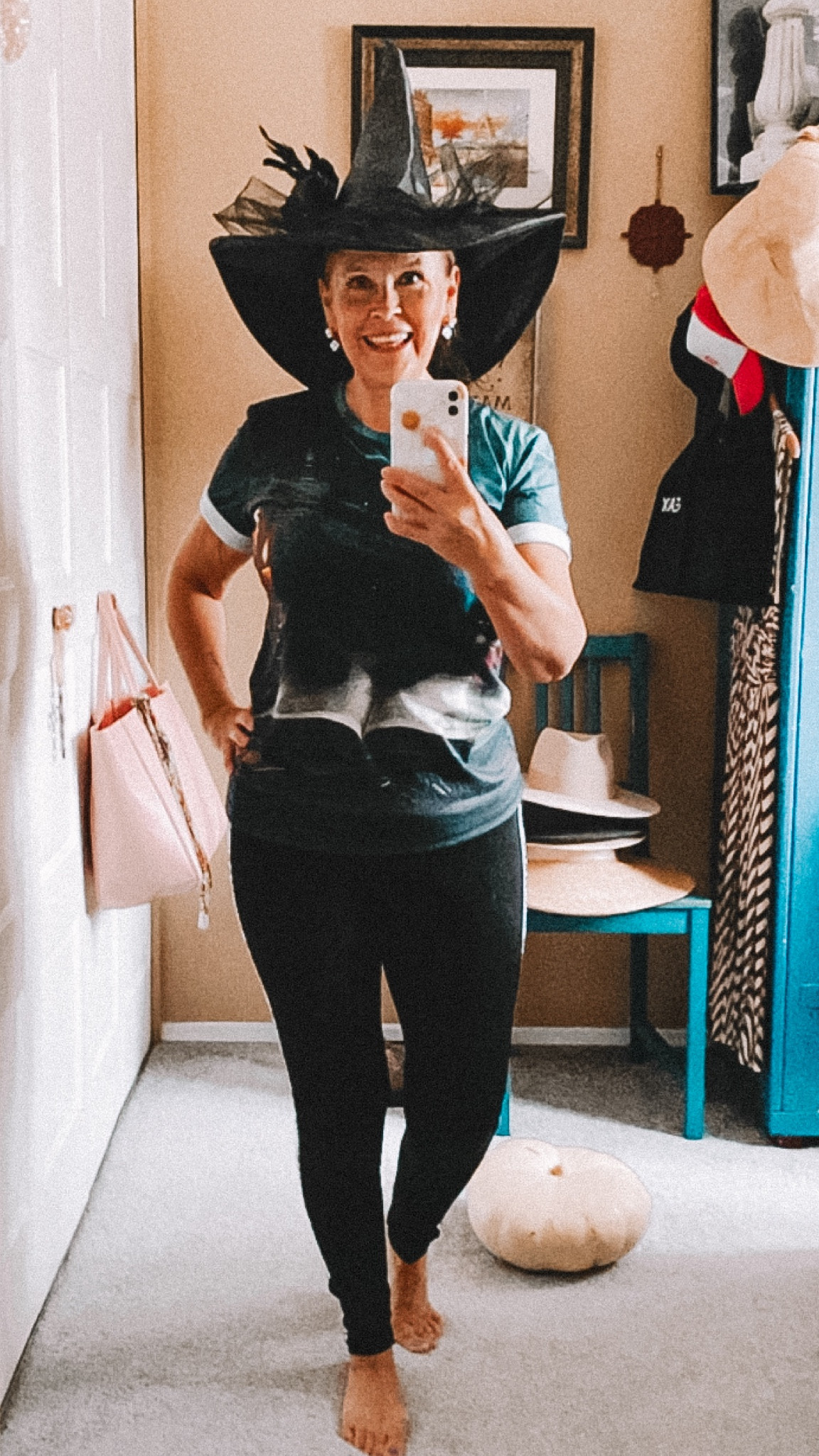 Halloween. All Hallows Eve is just around the corner. Wearing a fun outfit for handing out candy to the trick-or-treaters! My tee is from shebelieve.com in size small. I have linked some similars for you.🖤🧙🏼‍♀️

#LTKSeasonal #LTKHalloween #LTKstyletip