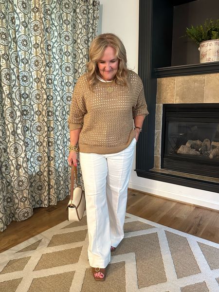 Summer neutrals! This sweater is beautiful. It has a rich gold bronze metallic color. I sized up for a more relaxed look. XL
Pants size 12 
I’ll link a similar white tee. You can wear a tank too.

Loft cyber sale 

#LTKSaleAlert #LTKOver40 #LTKFindsUnder50