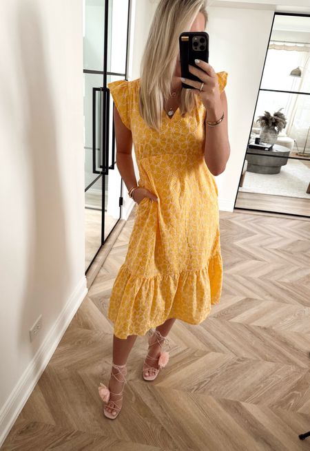 This $29 eyelet dress is a staple for spring and summer! Must have IMO! Gorgeous and great quality. I’m wearing a small. 

Heels, TTS.

Spring dress. Yellow dress. Spring outfit. Summer outfit. Vacation outfit. Sandals.

#LTKSeasonal #LTKfindsunder50 #LTKstyletip