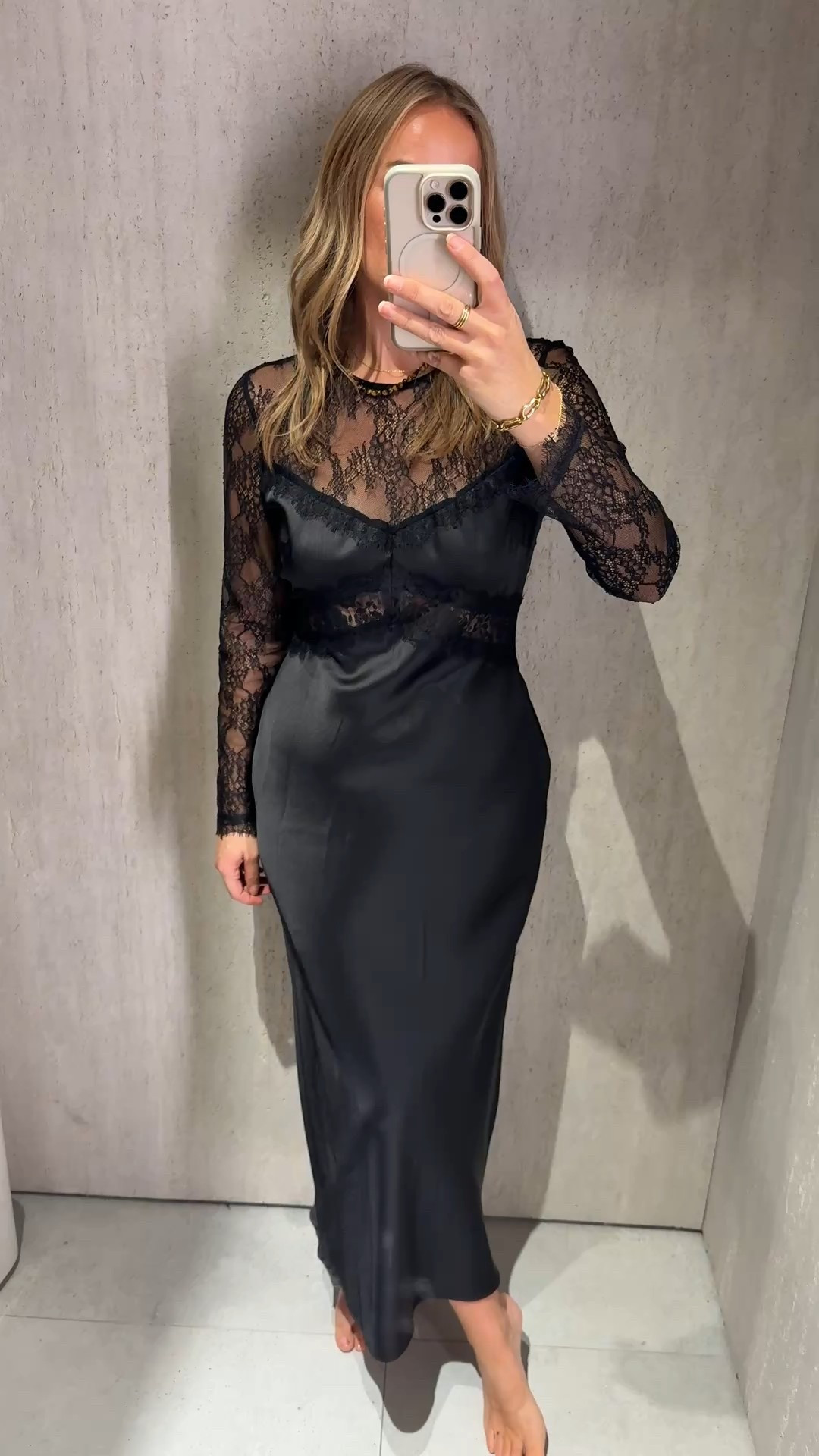 Also tried this satin and lace dress 
Big tick again for sleeves 👍🏻 
I love this one although not forgiving in the tummy in these down lights. 
I’d be tempted to add some shapewear just to smooth a little. 
Another lovely dress though that would work for many festive occasions 👌🏻
Wearing a large. 

Satin slip dress
Black lace dress 

#LTKpartywear #LTKdresses #LTKdatenight