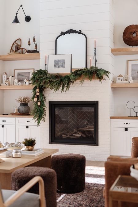 Shop the post! Today on IG I shared a reel how you can get this mantle look. 

Garland, Christmas decor, holiday decor, mantle decor, bells, brass bells, cedar, pine, coffee table, area rug, Christmas village, Christmas house, winter art, mirror 

#LTKunder100 #LTKHoliday #LTKhome