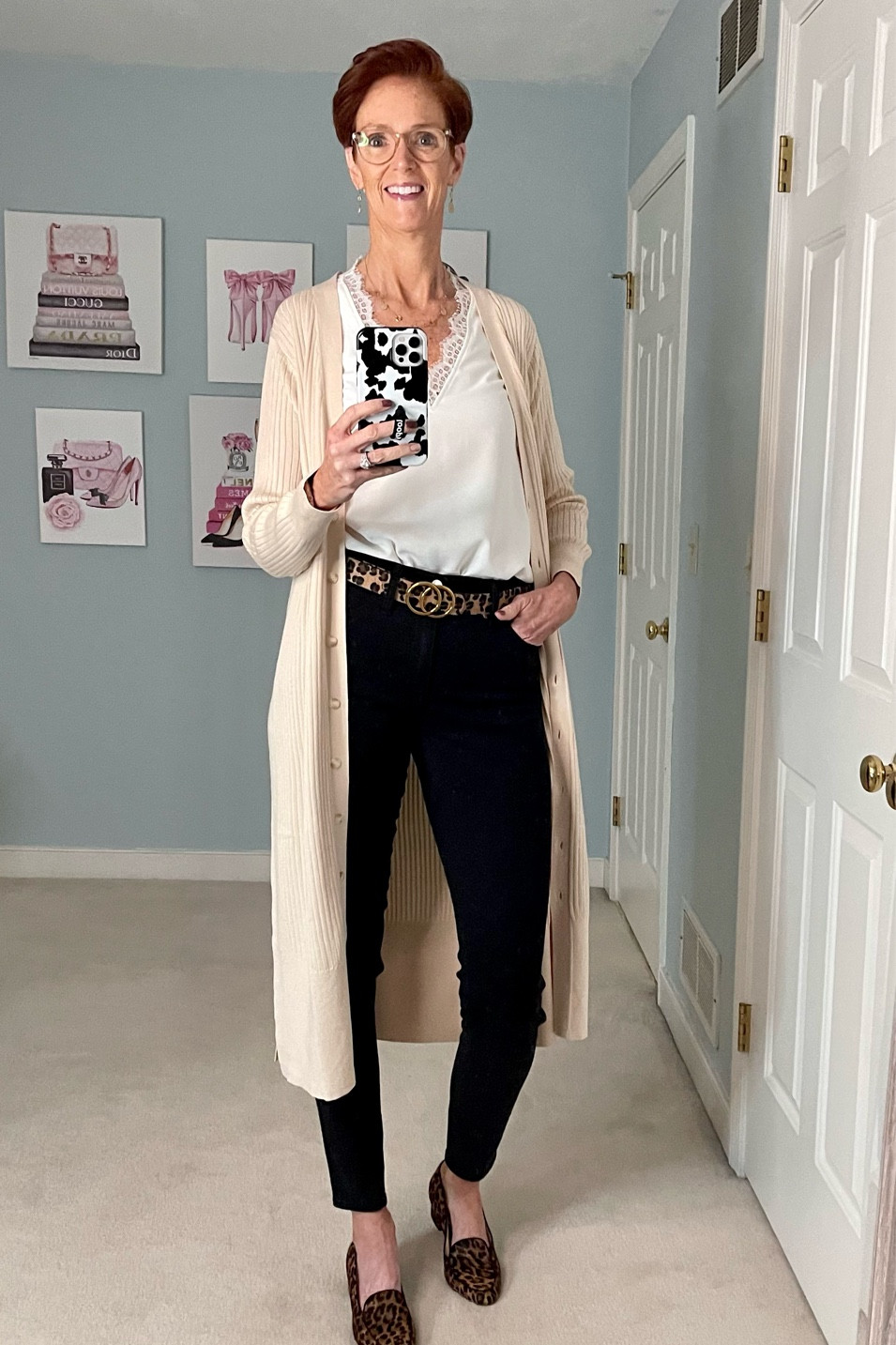 This is a great fall outfit on repeat. Easy layers with an elevated white top with lace trim, black jeans, and a duster cardigan.

Madewell jeans, Amazon too, brass sweater

Fall outfit, classic outfit, white top, duster cardigan, black jeans, leopard shoes

#LTKstyletip #LTKSale