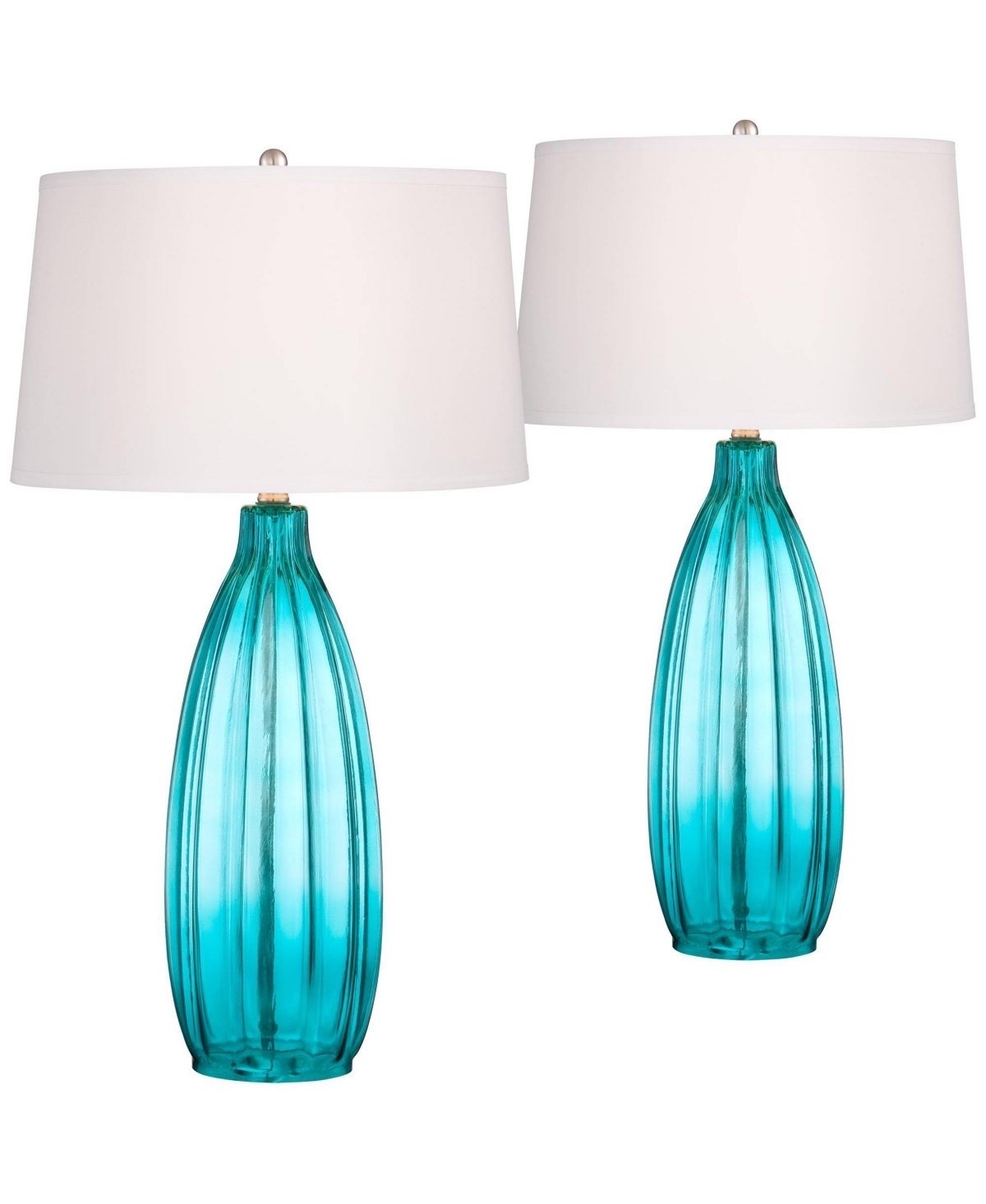 Coastal charm meets everyday elegance 🌊💙 These beautiful fluted blue glass table lamps come as a set of two and instantly elevate any space.
#LTKHome #LTKStyle #CoastalDecor #HomeDecorFinds #HomeStyling #BedroomDecor  #Ad

#LTKHome