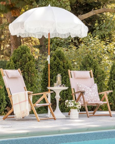 Outdoor fringe, outdoor decor, patio, pool loungr, pink sling chair, outdoor living, beach vacation spring summer, white umbrella Poolside, outdoor chairs coastal decor style 

#LTKhome #LTKunder50 #LTKsalealert