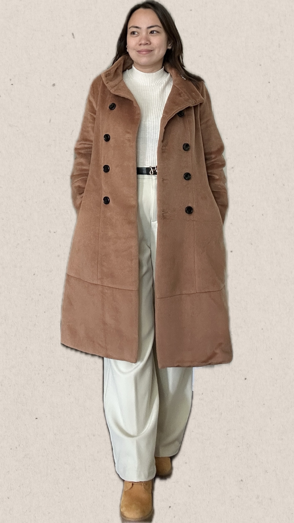Pair the white mock neck knit sweater with the off-white straight suit pants for a sleek, monochromatic base. Add a touch of rugged elegance with the Timberland 6” boots, contrasting against the refined ensemble. Finally, layer on the brown wool stand collar coat for warmth and texture, completing the look with a sophisticated edge.

#LTKmidsize #LTKSeasonal #LTKstyletip