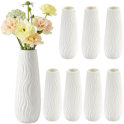 Qinyoung set of eight small white ceramic bud vases