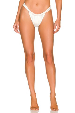 AEXAE Ruched Bikini Bottom in Chalk from Revolve.com | Revolve Clothing (Global)