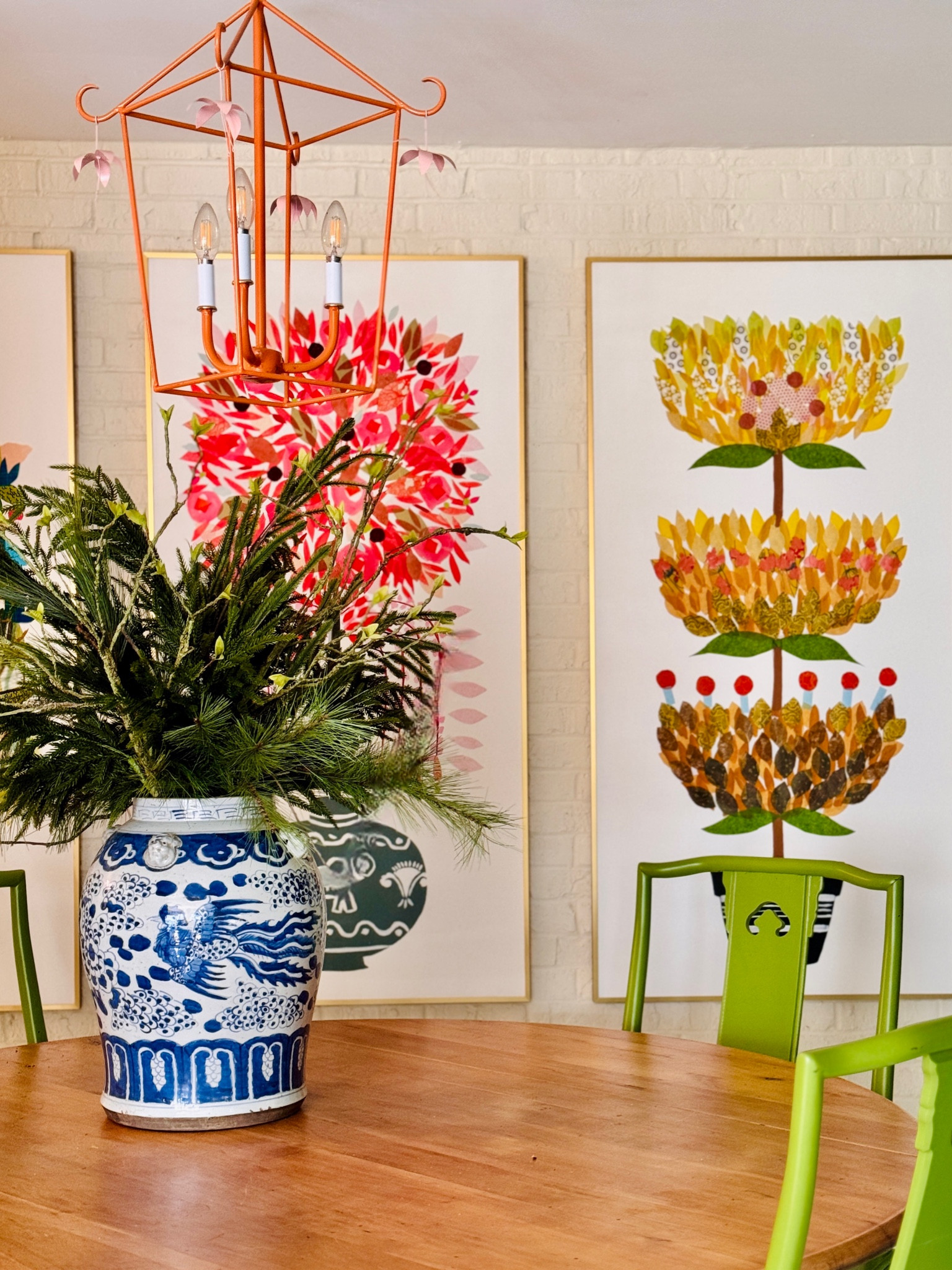 Colorful and joyful wall decor is essential in my living space. I love to feel a sense of happiness whenever I walk by the artwork adorning my walls. These vibrant prints are created by a talented local artist who is also a friend of mine. When you combine them with playful green dining chairs and a striking chinoiserie jar, you’ve got a fantastic design combination!

#LTKHome