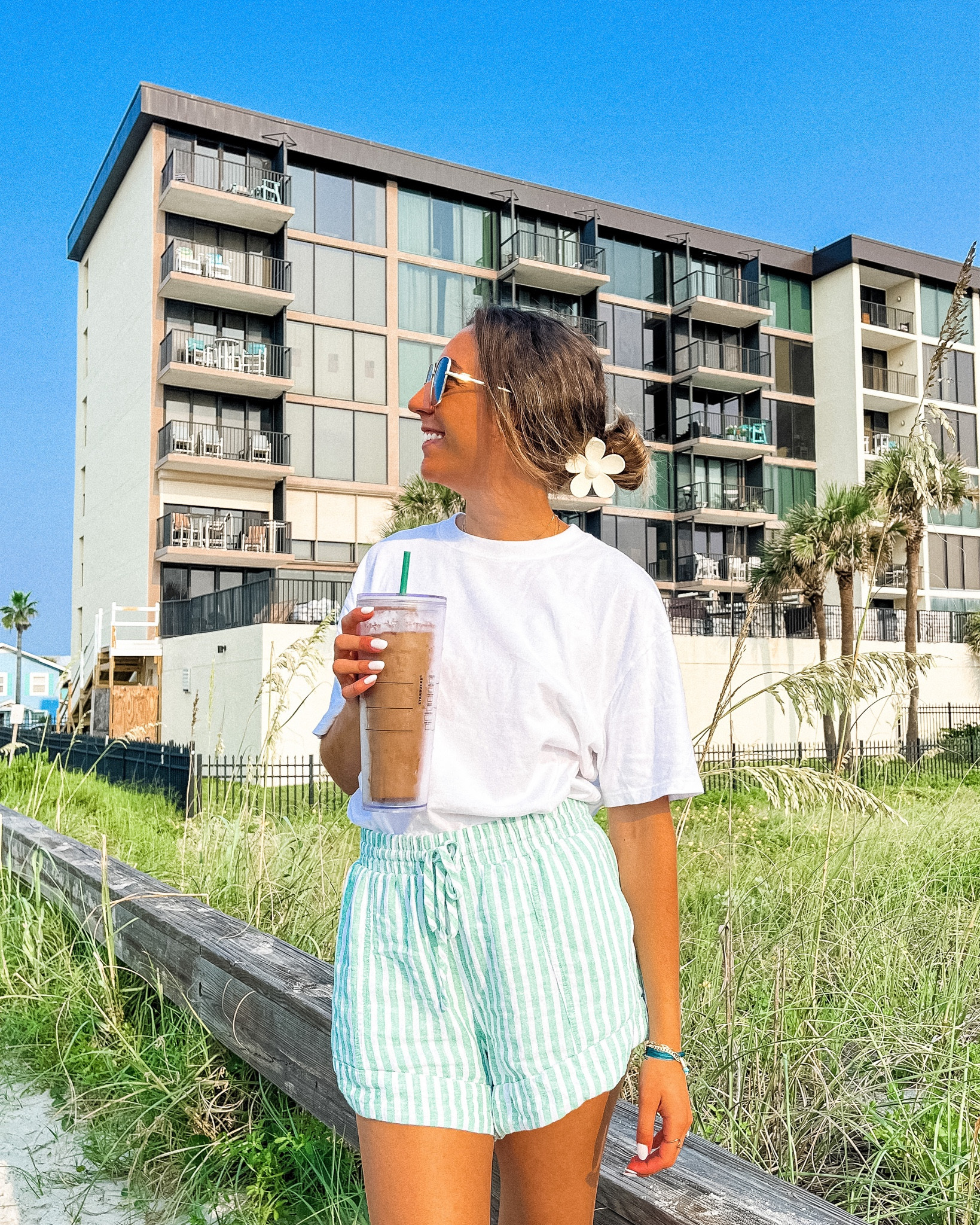 Florida Summer Vacation Casual Outfit; Abercrombie Basic Tee, Princess Polly Shorts, Viral Flower Hair Claw Clip, Starbucks Coffee, Amazon Sunglasses, Pura Vida Bracelets, Olive and June Nails

#LTKSeasonal #LTKstyletip
