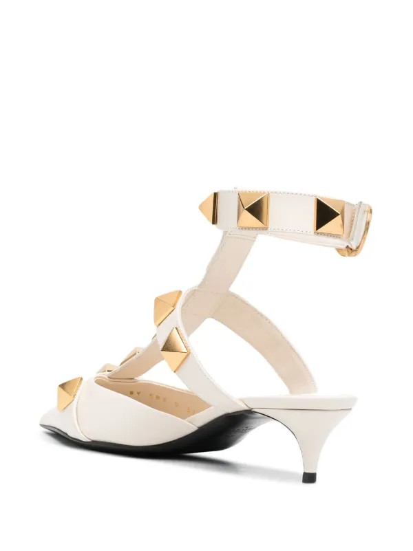 rockstud-detail pointed-toe pumps | Farfetch Global