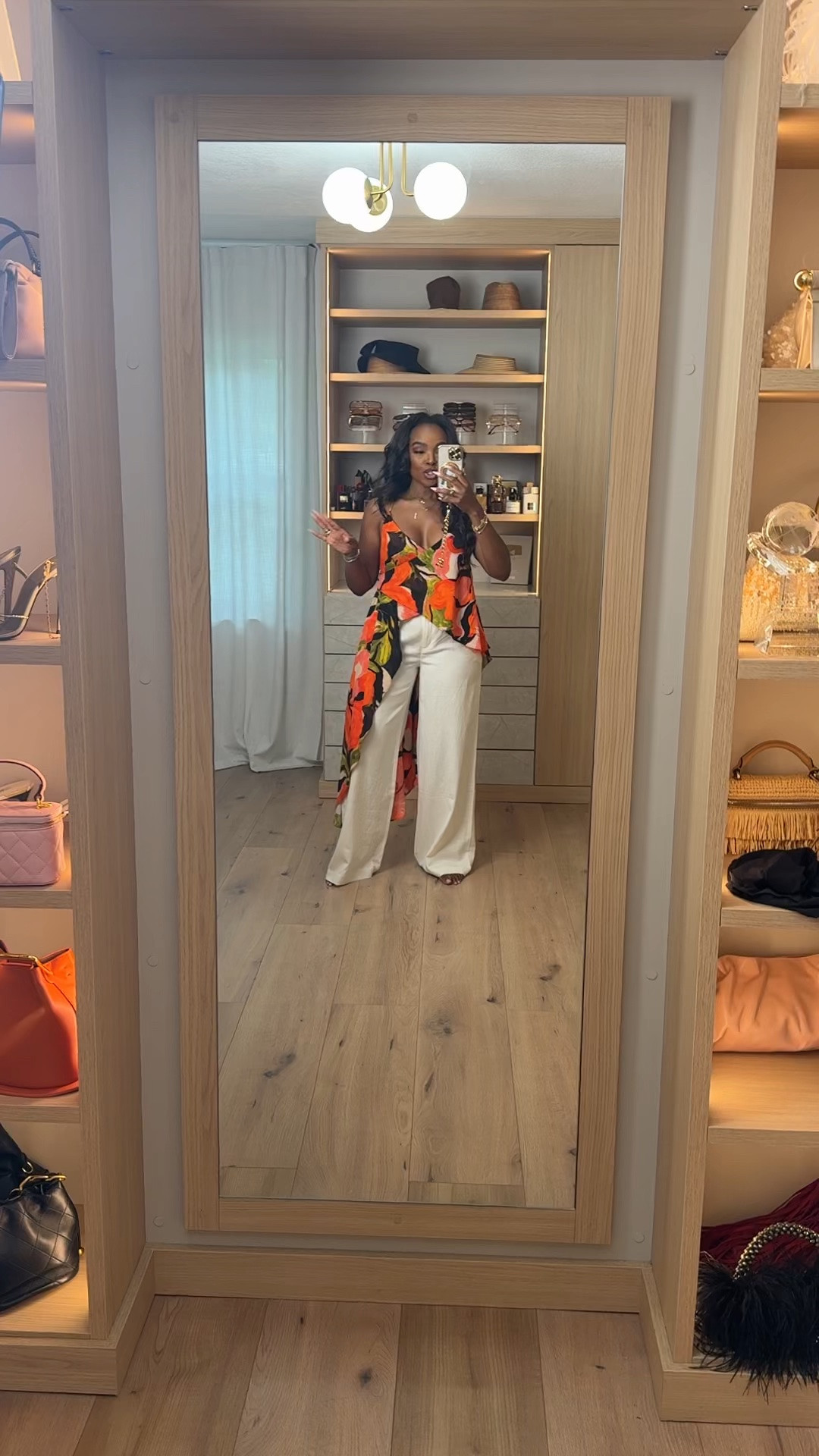 Hi Babes!

This outfit is what I call vacation confidence in one look 🌺☀️✨

The vibrant tropical print paired with crisp white trousers is such a stunning combination. It feels bold, elevated, and effortless all at the same time. The flowy top brings all the drama while the neutral bottoms keep the look balanced and chic.

Where to wear this:
• Tropical vacation
• Resort dinner
• Cruise night
• Beachside restaurant
• Summer happy hour

Undergarments: Nude seamless bra and underwear recommended.

Everything is linked below!

xx Kira | IG: KirasFashionFinds

34D - 27 - 40 • Size Small or 4