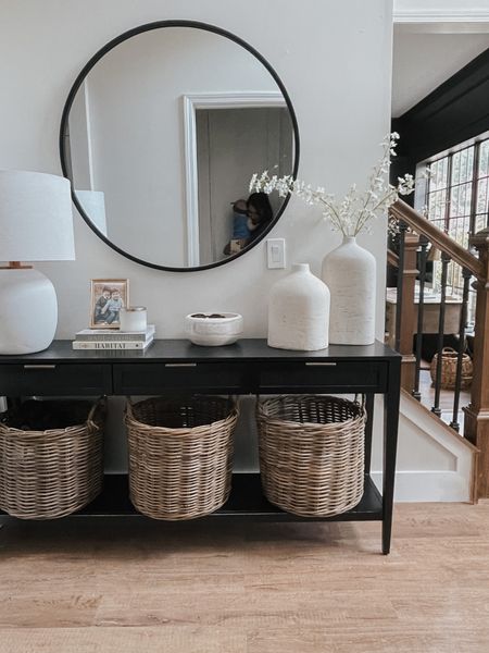 entryway decor: round mirror, baskets, console table, vase



#LTKhome