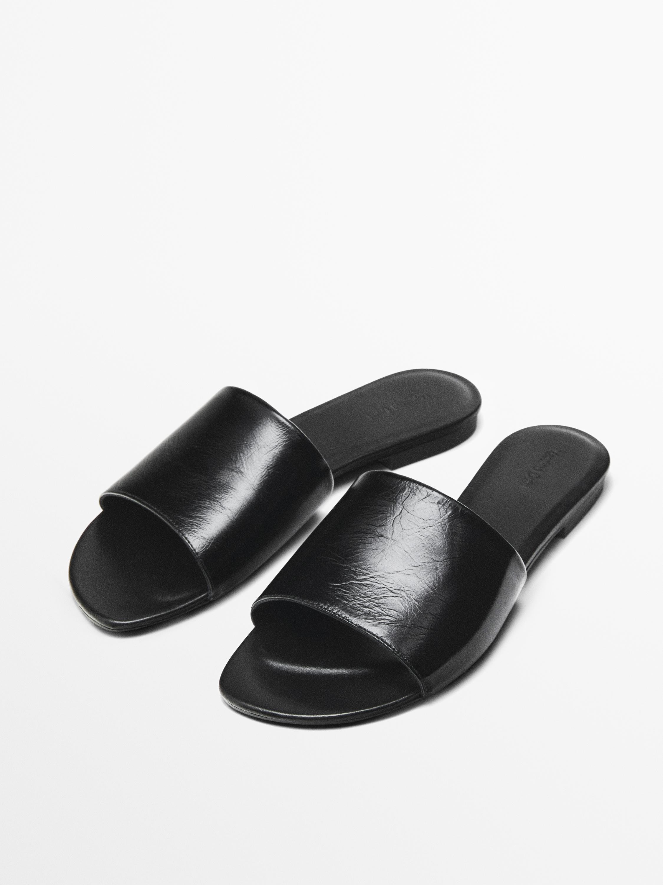Made of cowhide leather. Leather lining and insole . Wrinkled faux leather. Made in Spain. Includ... | Massimo Dutti US