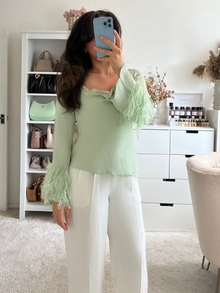 Mint green top, white trousers, Lily Silk, feather cuff top, feathers, summer outfit, neutrals, evening top, smart trousers, feather outfit 

#LTKstyletip #LTKSeasonal #LTKeurope