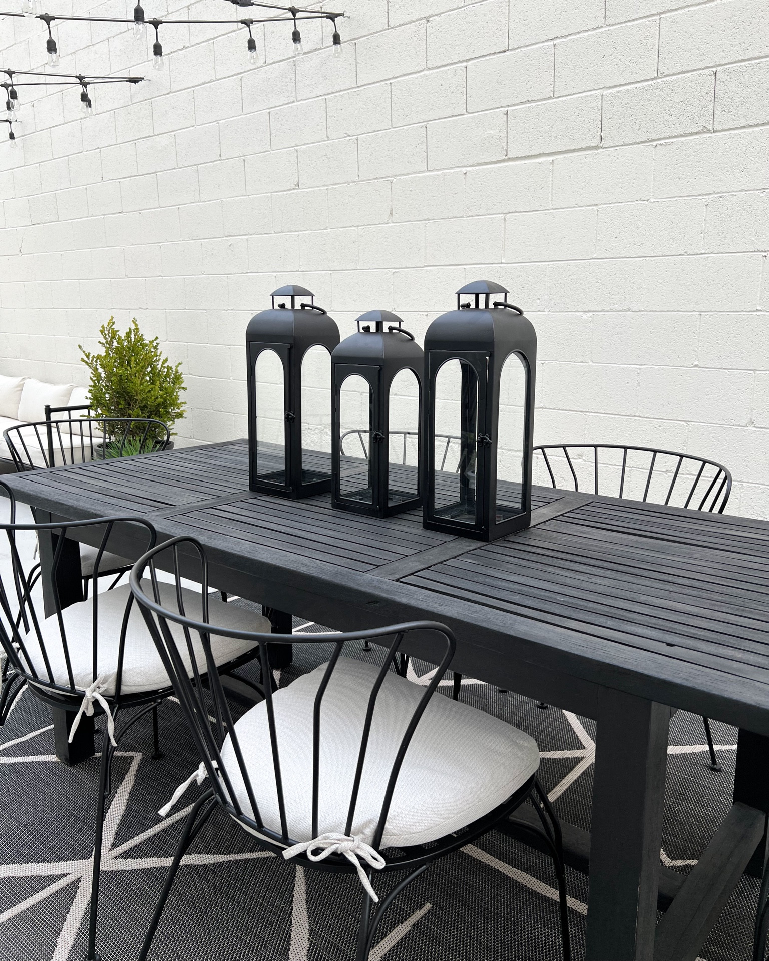 Outdoor lanterns. Outdoor candle holder. Outdoor space, patio furniture. Home decor. Outdoor living space. 

#LTKHome #LTKSeasonal