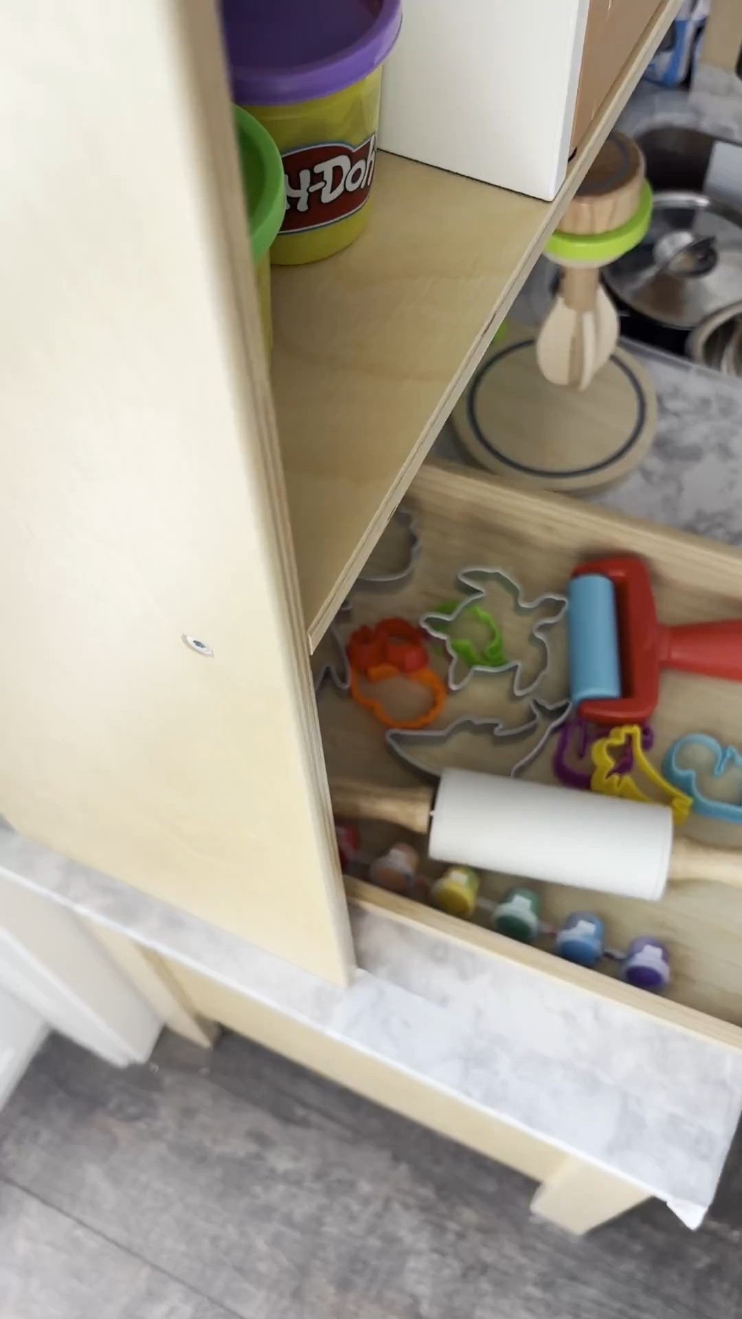 Our toy kitchen is from IKEA, but I’ve linked similar toy kitchens on Amazon 