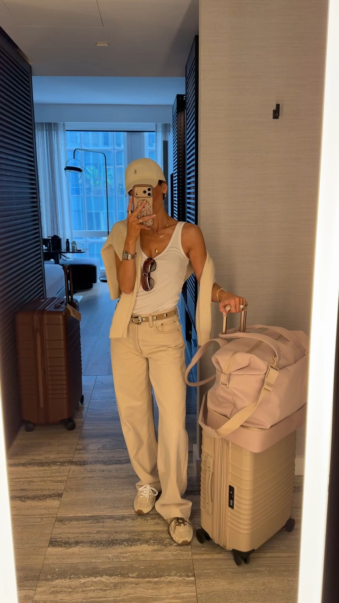 Airport outfit - Agolde jeans (so cool, mid rise, oversized fit/25) @Zara   tank and @Vuori US cashmere crew neck! As always my @beistravel beistravel luggage started set (super roomy and chic)

#LTKgrwm #LTKootd #LTKTravel