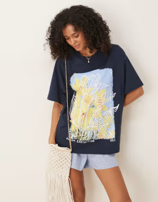 ASOS DESIGN oversized t-shirt with yellow flower graphic in navy | ASOS | ASOS (Global)