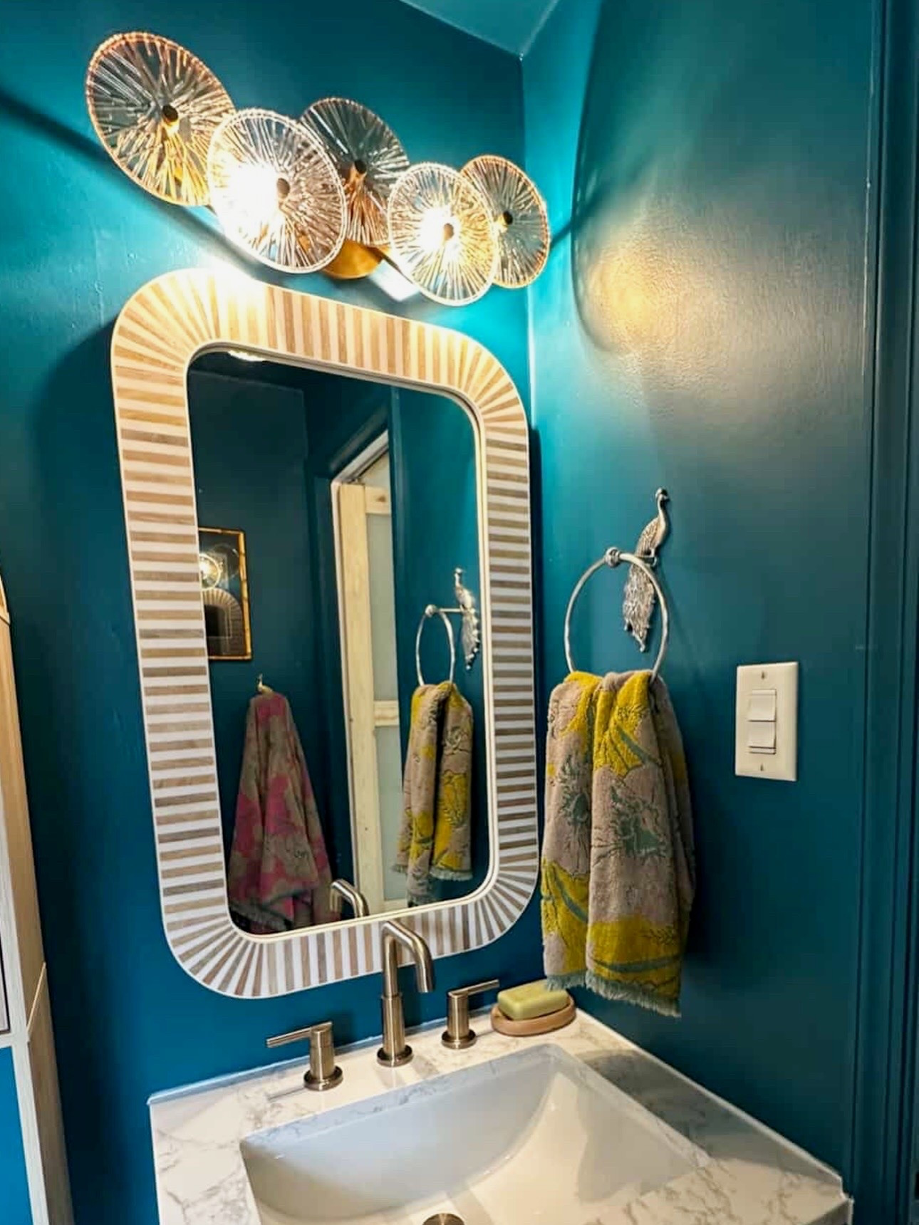 🦚 A Color Drenched Bathroom Oasis that gives off all the Boutique Hotel Vibes. 

☀️ Designer Tip: Items that will instantly elevate your space include: 
🦚 a fun towel ring 
🤎 Bone inlay mirror 
✨champagne gold faucet
💡2,700 K sconce with just the right glow 
💚 A fun vanity with a pop of color & drawers for easy organization.

#LTKselfcare #LTKHome #LTKSaleAlert