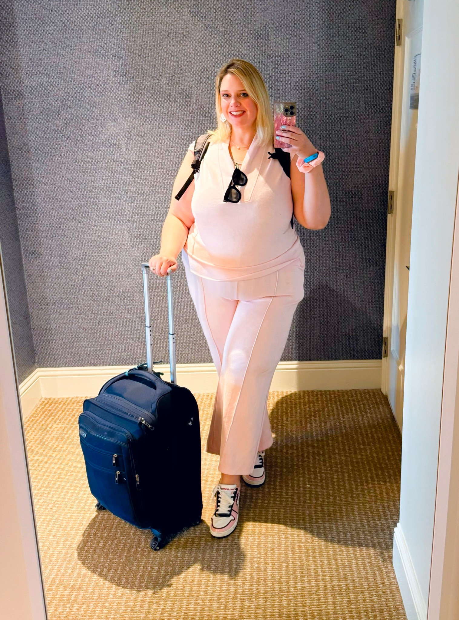 Pink scruba knit for my travel day. These pieces are under $25 each and now come in hot pink 🙌

#LTKTravel #LTKootd #LTKFindsUnder50