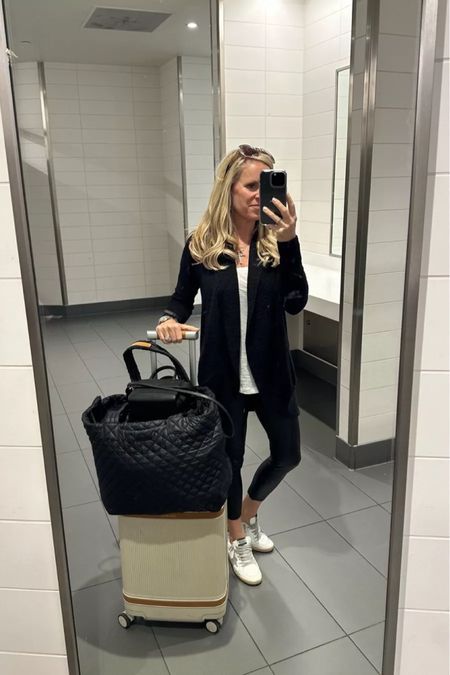 Favorite travel look! Barefoot Dreams cardigan Best White T $20! Commando Faux Leather Leggings Golden Goose sneakers Best carry one suitcase that rolls like a dream! Paravel aviator plus suitcase Best Travel Tote MZ Wallace large metro tote deluxe

#LTKstyletip #LTKtravel #LTKFind
