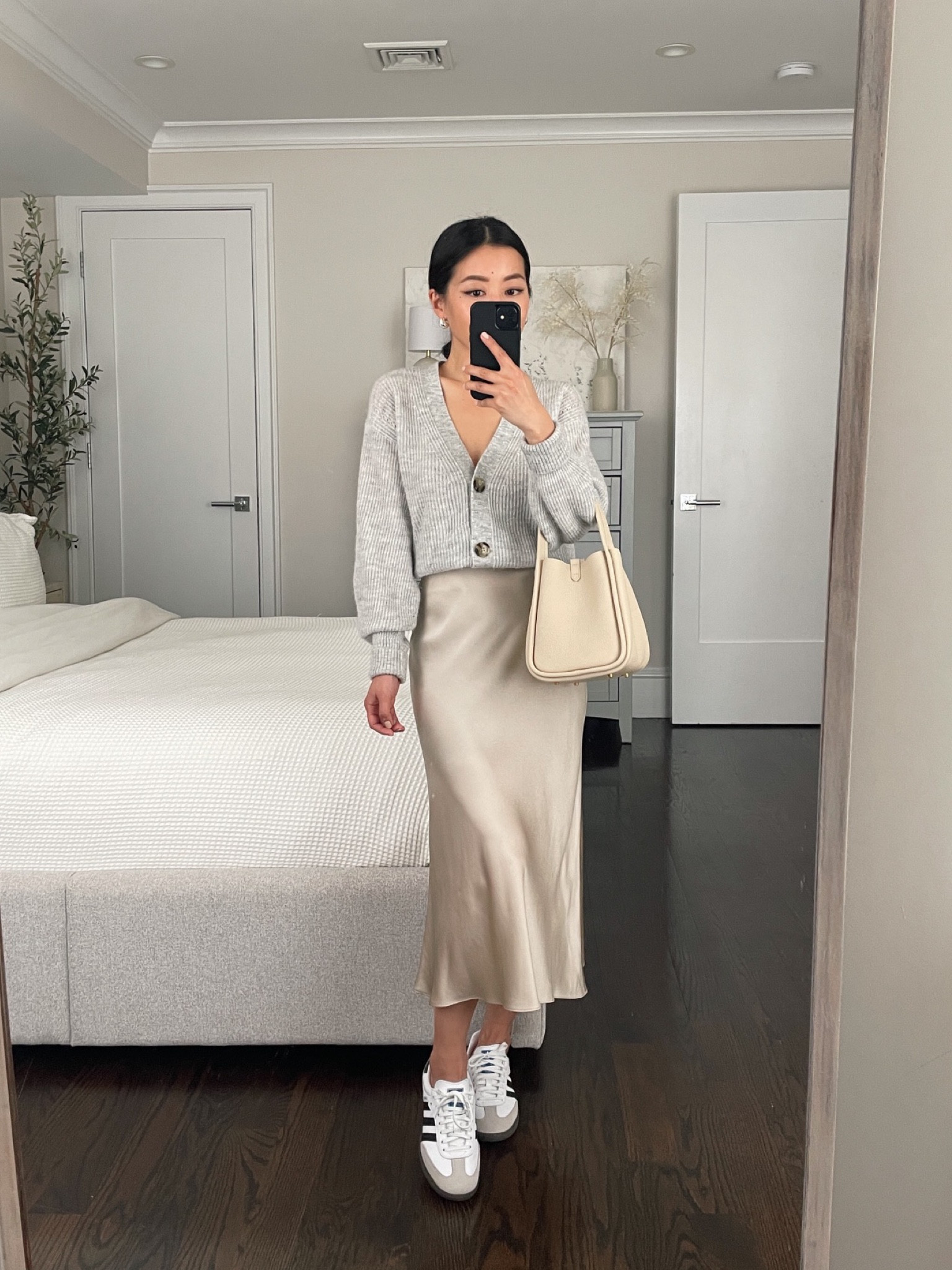 Quince is having a rare one day sale including this silk slip skirt! First time I’ve ever seen it on sale 

• Quince slip skirt in champagne xs - worn with uniqlo shaper shorts xxs

• Quince alpaca cardigan sweater xs

• Adidas sambas men’s 4 fits women’s 5/5.5

• Songmont bag 

#petite smart casual outfits 

#LTKSaleAlert #LTKFindsUnder100 #LTKFindsUnder50