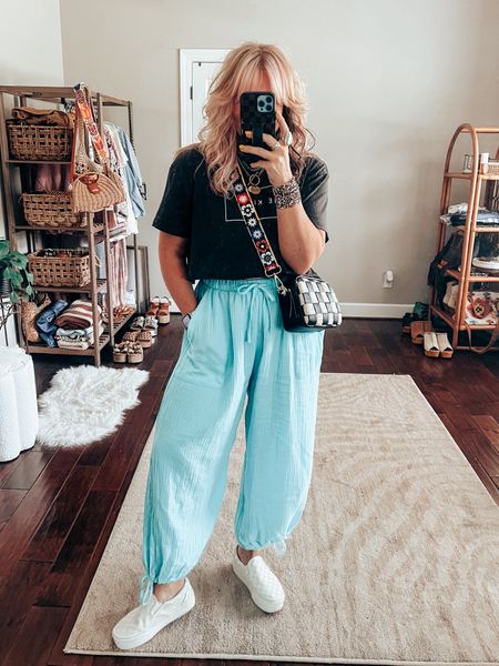 These turquoise blue gauze pants are so cute and comfy! Love these styled with a cropped graphic tee!! I cut this tee and LOVE IT! It says “be kind” 🖤✨
Tee size XL
Pants size M
Vans sized down 
✨WATCHBAND save with code MANDIE
✨Necklace save with code MANDIE15 


#LTKStyleTip #LTKFindsUnder50 #LTKOver40