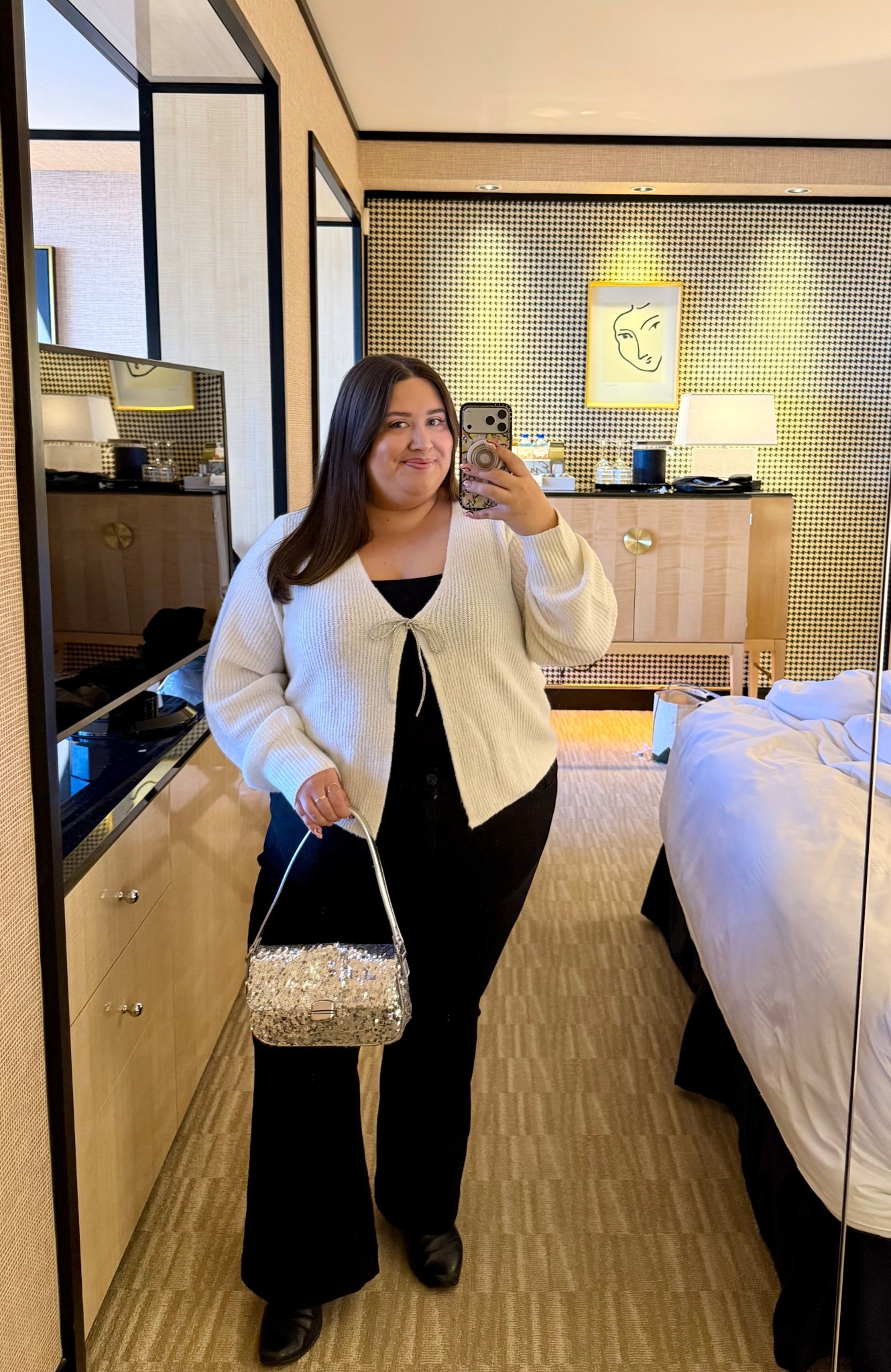 How darling is this bow sweater?! Cannot wait to wear it to some holiday parties this winter ❄️ 

#LTKSaleAlert #LTKPlusSize #LTKHoliday