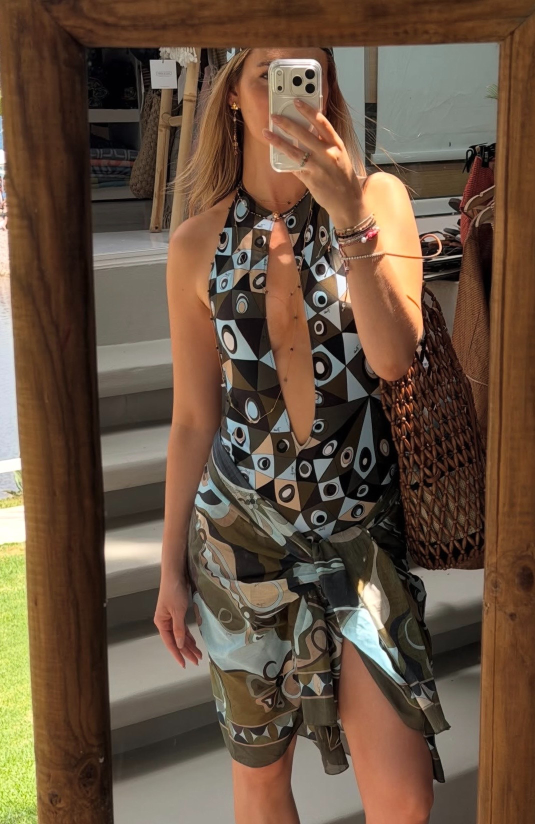I've been living in Emilio Pucci on this trip, and this might be my favorite look yet. The Pucci Occhi print swimsuit is so flattering, and I love how the print makes it feel like you're wearing a bodysuit instead of just swimwear.

I tied the Pucci Orchidee cotton beach cover-up around my waist for an easy beach-to-lunch look, then finished it with the Pucci Manuba print silk bandana in green.

#LTKootd #LTKBeauty #LTKTravel
