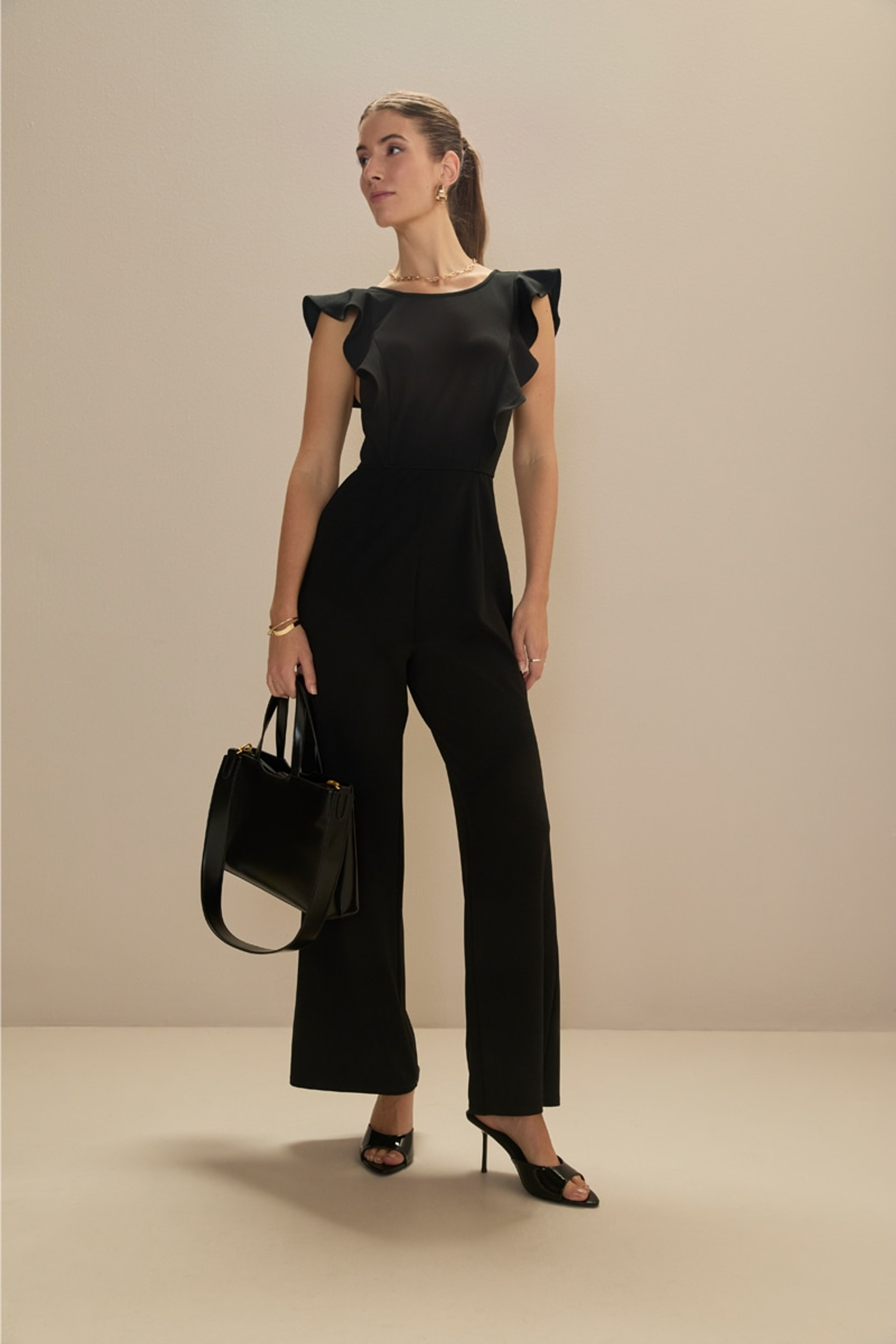 Dionne Flutter Sleeve Jumpsuit | Francesca's