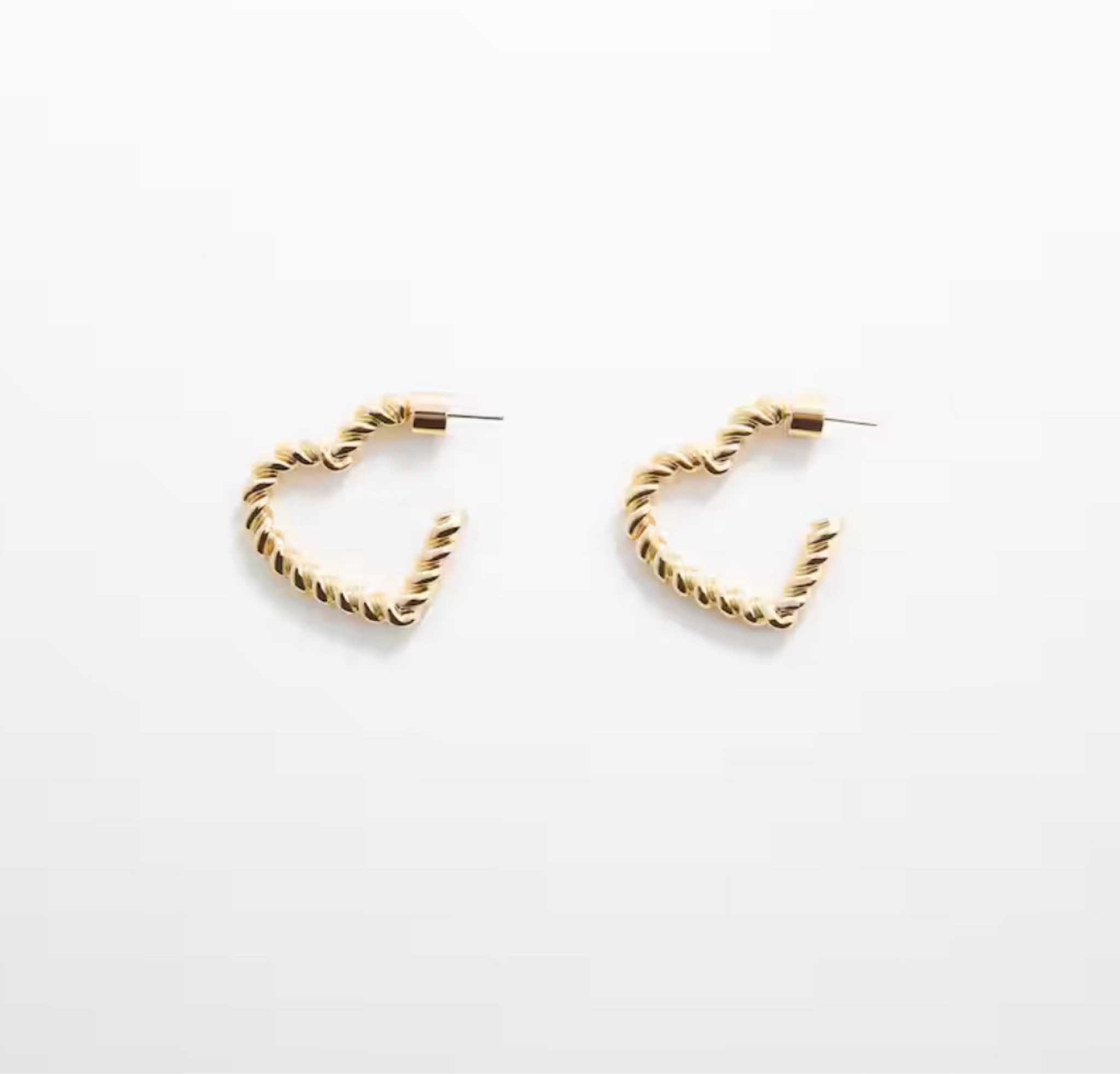 Heart twister earrings 

#LTKstyletip #LTKfindsunder50 #LTKGiftGuide